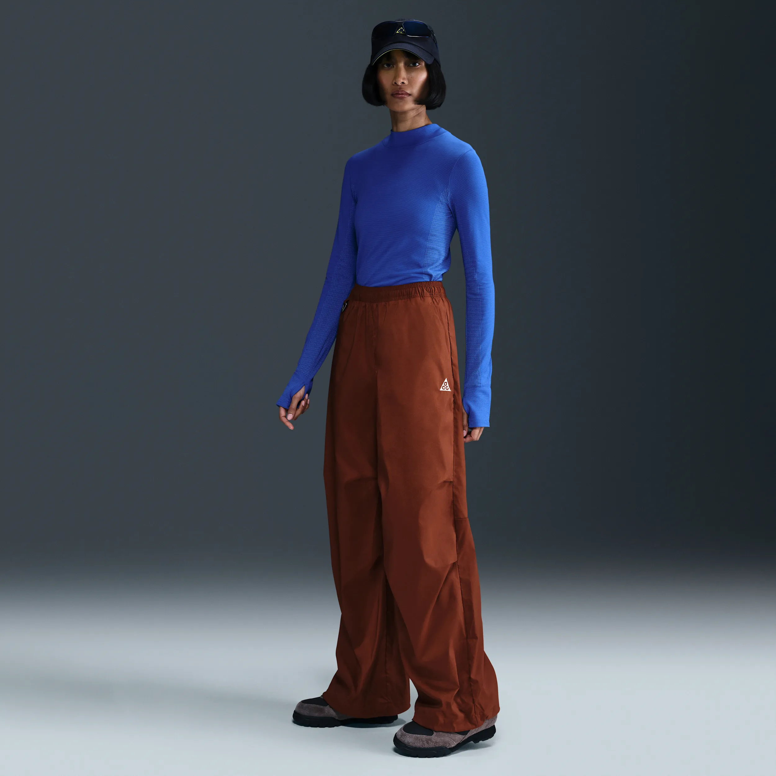 854c4c_Nike-ACG-Activitorium-High-Waisted-Uv-Pants-WMNS_CINNAMON-PICANTE-RED_FV7319-245_img1