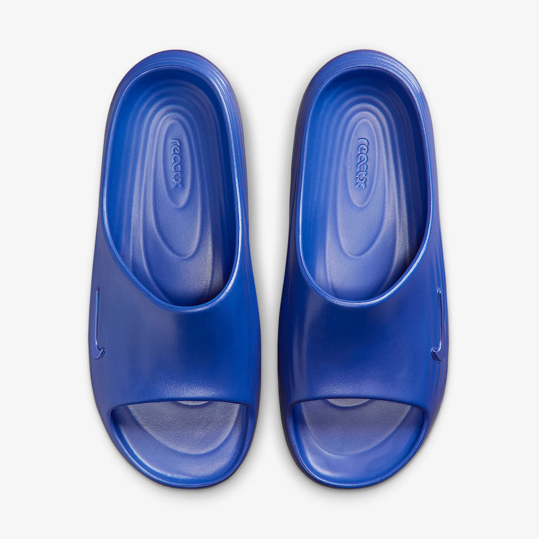 1D1446_Nike-ReactX-Rejuven8-Slide_HYPER-ROYAL_HV4479-401_img3