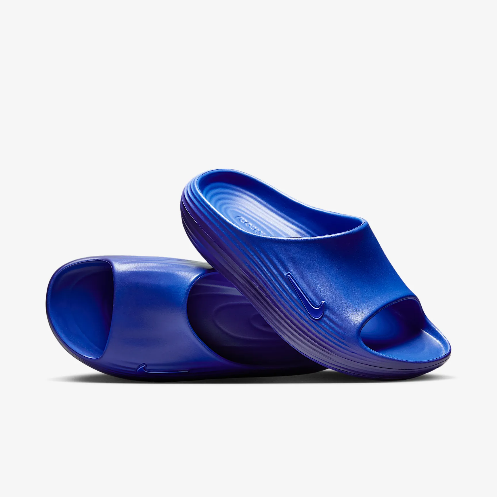 1D1446_Nike-ReactX-Rejuven8-Slide_HYPER-ROYAL_HV4479-401_img4