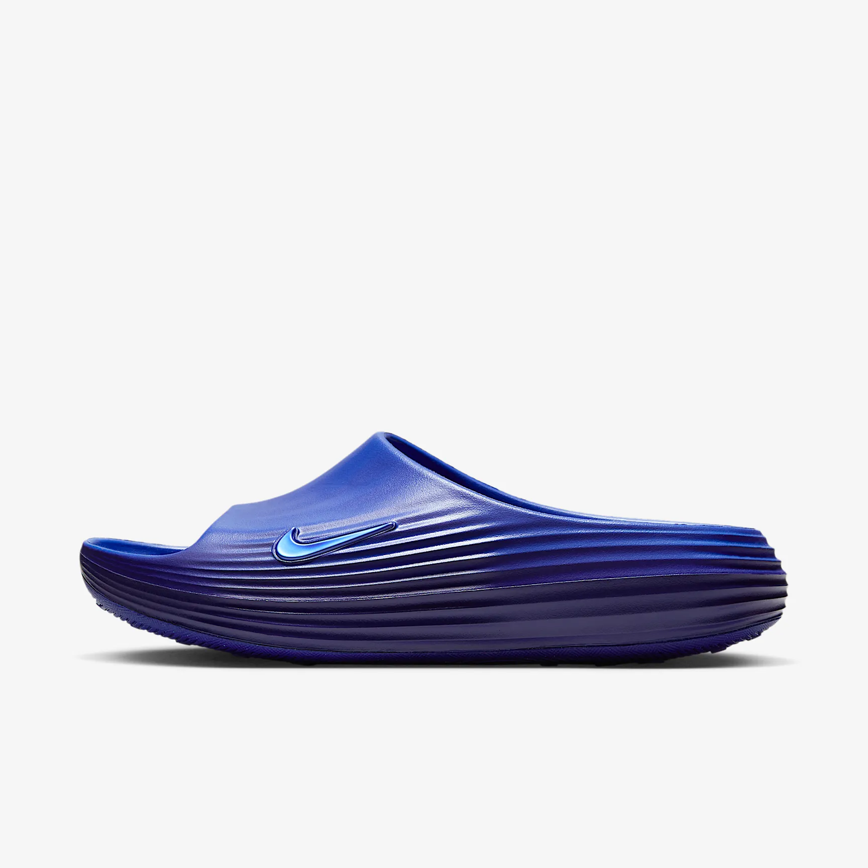1D1446_Nike-ReactX-Rejuven8-Slide_HYPER-ROYAL_HV4479-401_img0