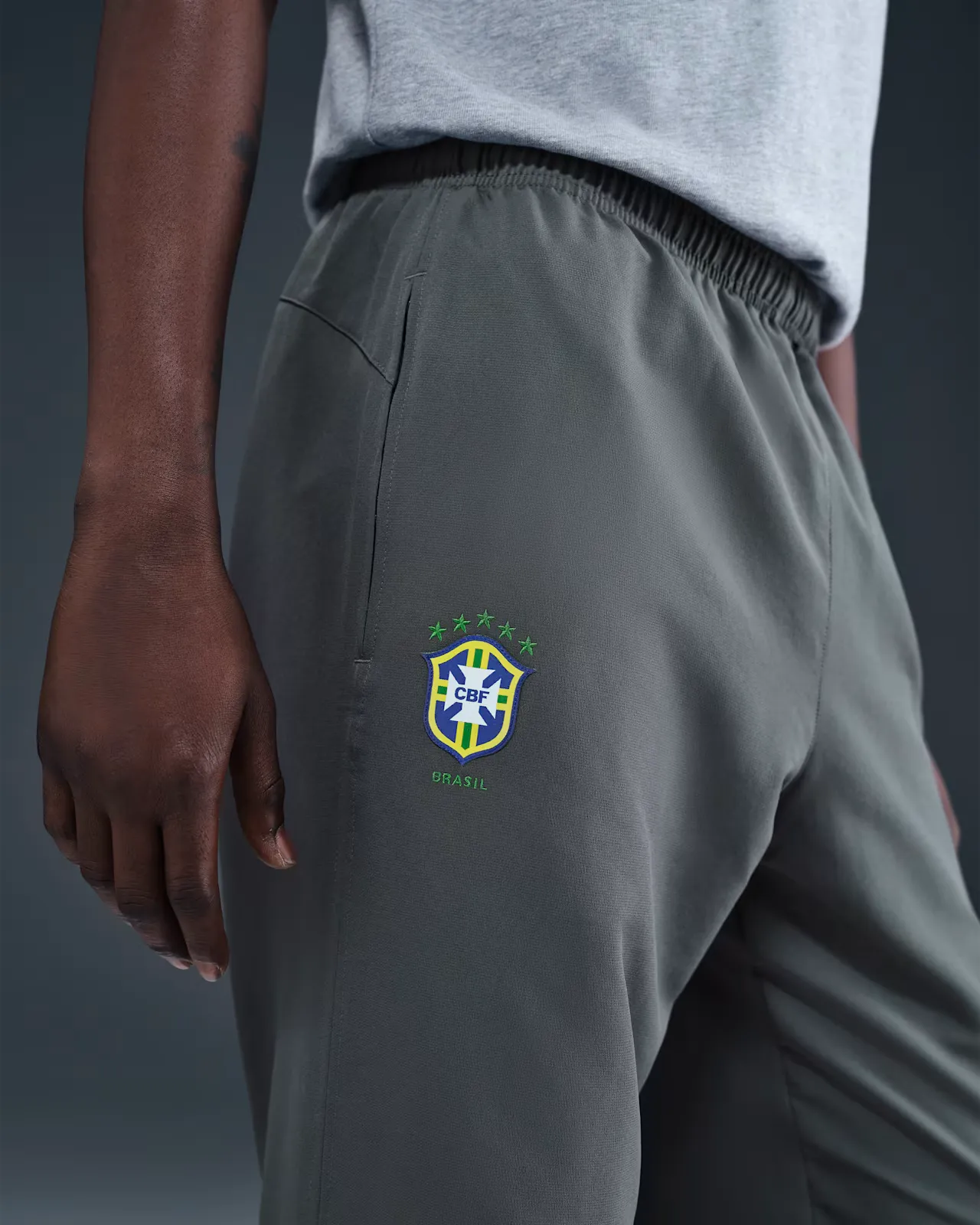 4D4E55_Nike-Brazil-Reissue-Soccer-Track-Pants_GREY-YELLOW_HV4431-021_img1