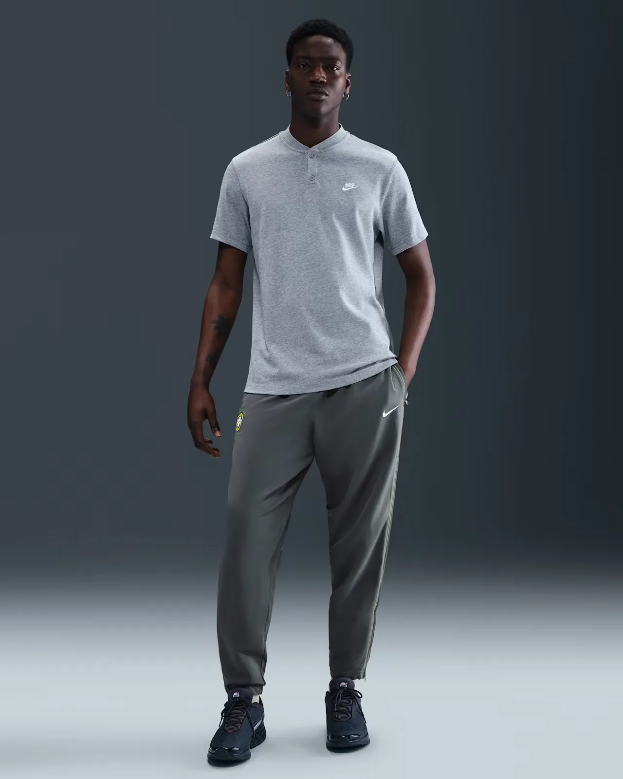 4D4E55_Nike-Brazil-Reissue-Soccer-Track-Pants_GREY-YELLOW_HV4431-021_img0