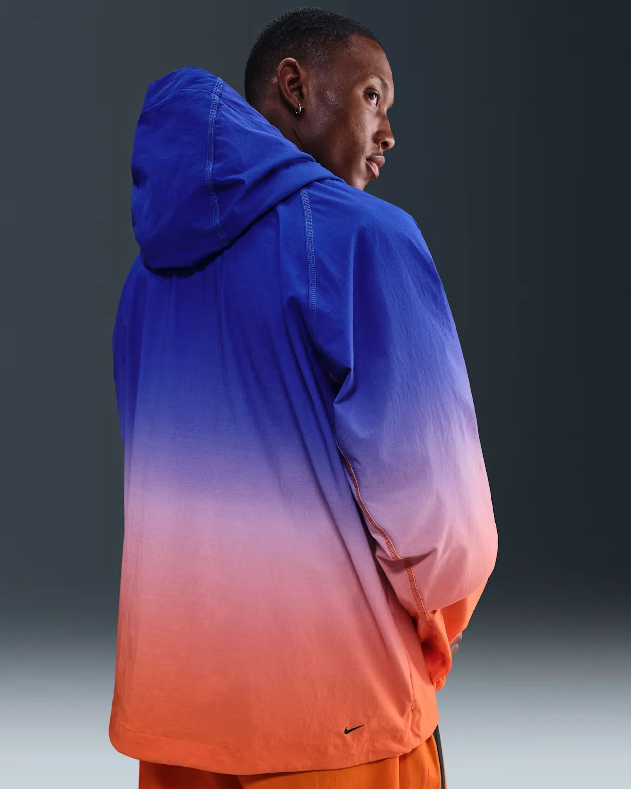 1D1F83_Nike-Tech-Woven-Windrunner-Full-Zip-Jacket_VIVID-ORANGE-GAME-ROYAL_II4622-480_img1