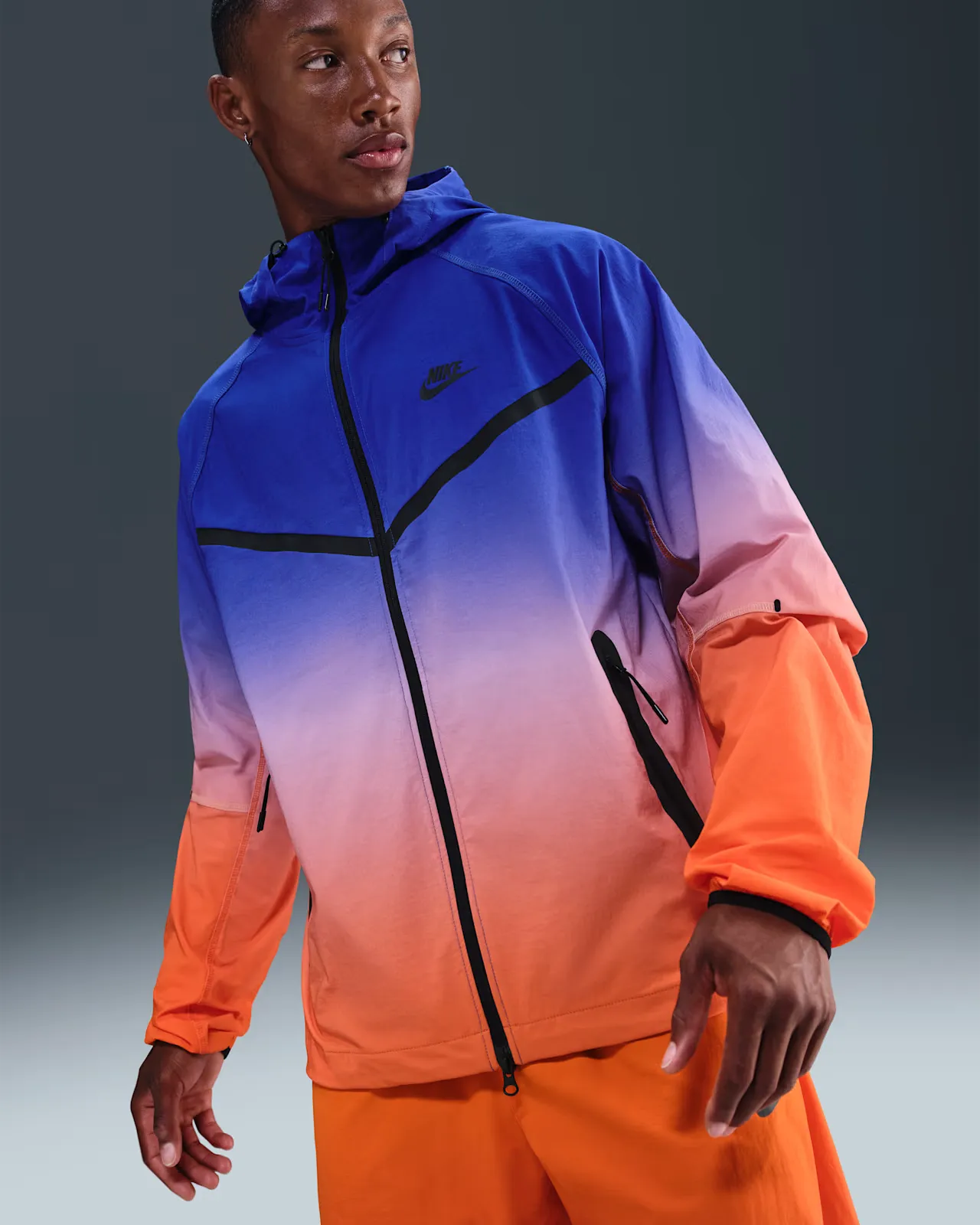 1D1F83_Nike-Tech-Woven-Windrunner-Full-Zip-Jacket_VIVID-ORANGE-GAME-ROYAL_II4622-480_img0