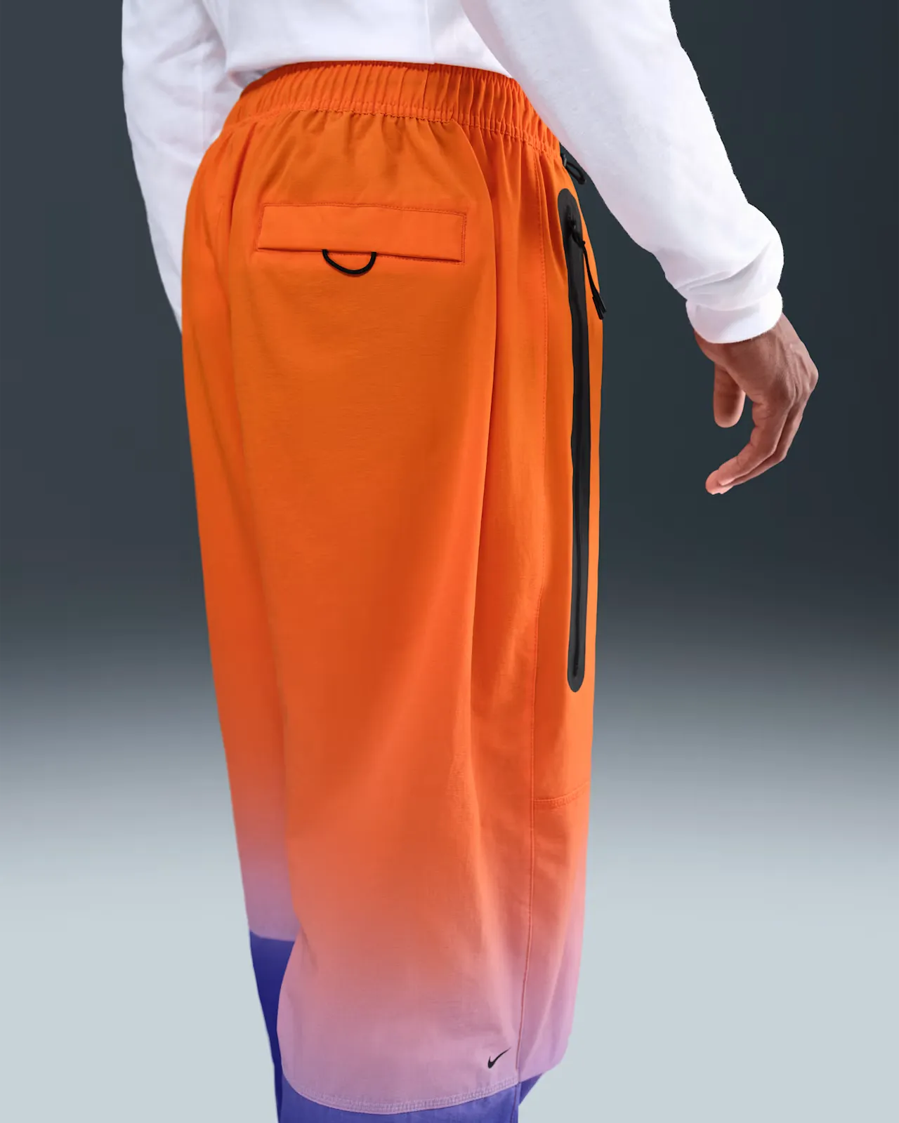 1E1D78_Nike-Tech-Woven-Pants_VIVID-ORANGE-GAME-ROYAL_II4634-480_img1