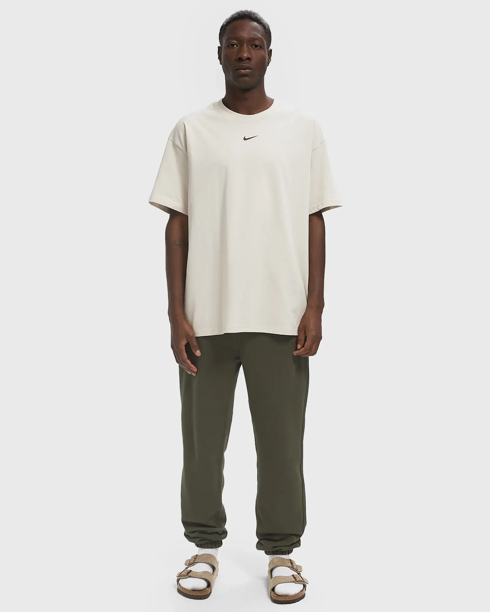 E7E4DE_Nocta-x-Nike-NRG-Tee-shirt_OREWOOD_IB5673-104_img1