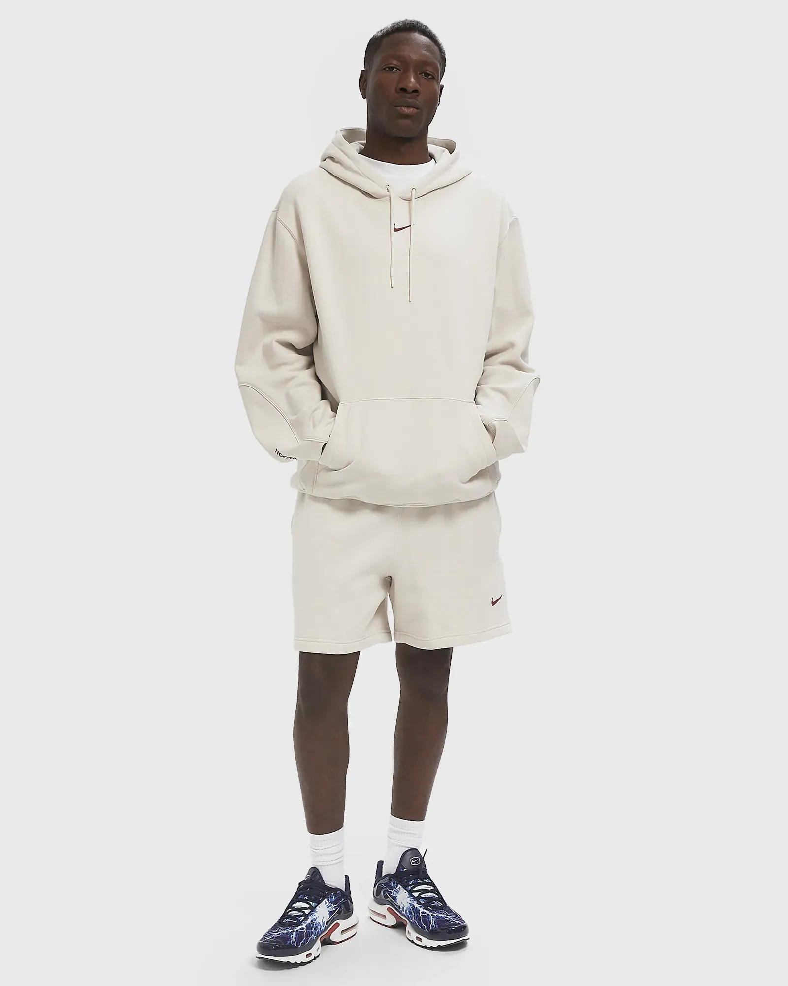 E5E1DC_Nocta-x-Nike-NRG-Fleece-Hoodie_OREWOOD_HM5762-104_img1