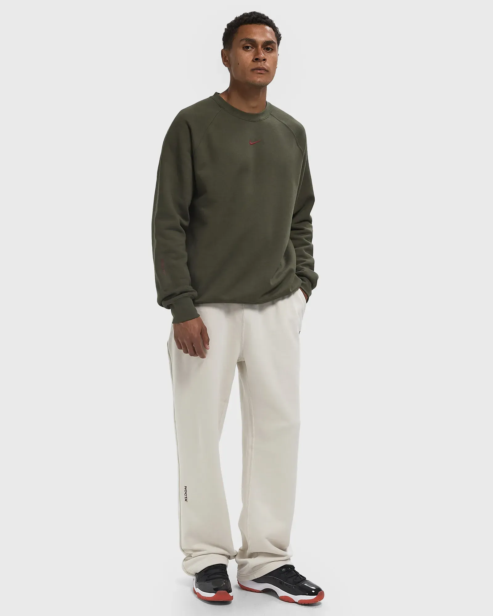 D8D5CF_Nocta-x-Nike-NRG-Fleece-Pants_OREWOOD_FZ4675-104_img1