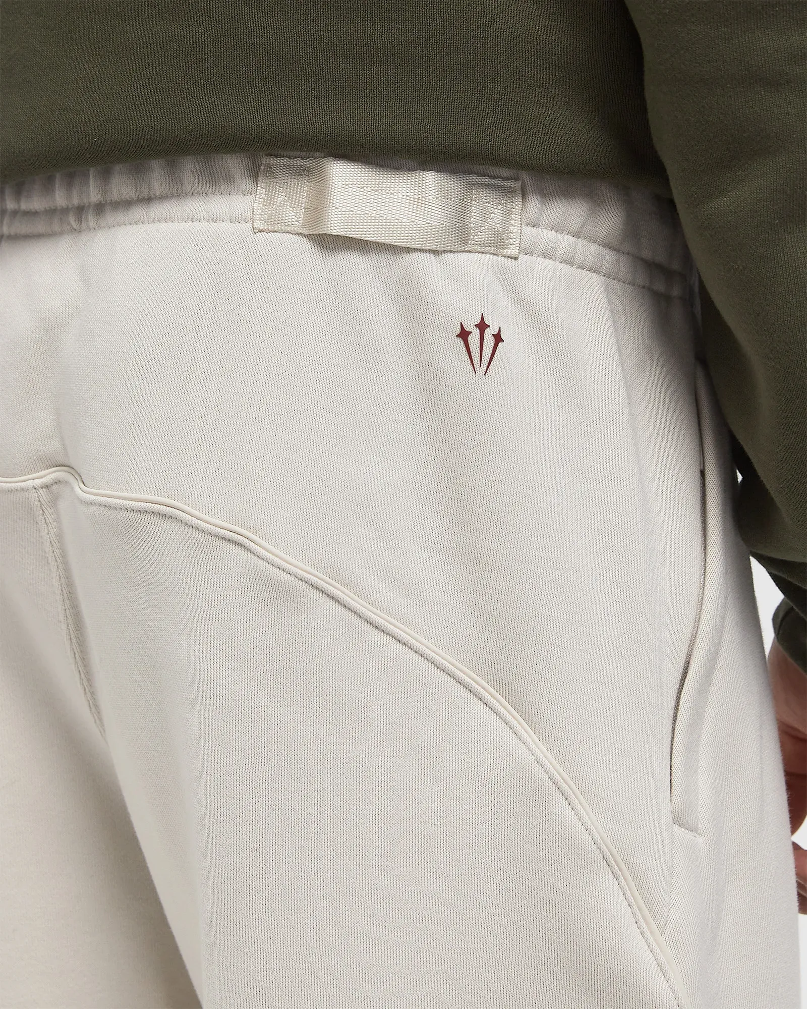 D8D5CF_Nocta-x-Nike-NRG-Fleece-Pants_OREWOOD_FZ4675-104_img3