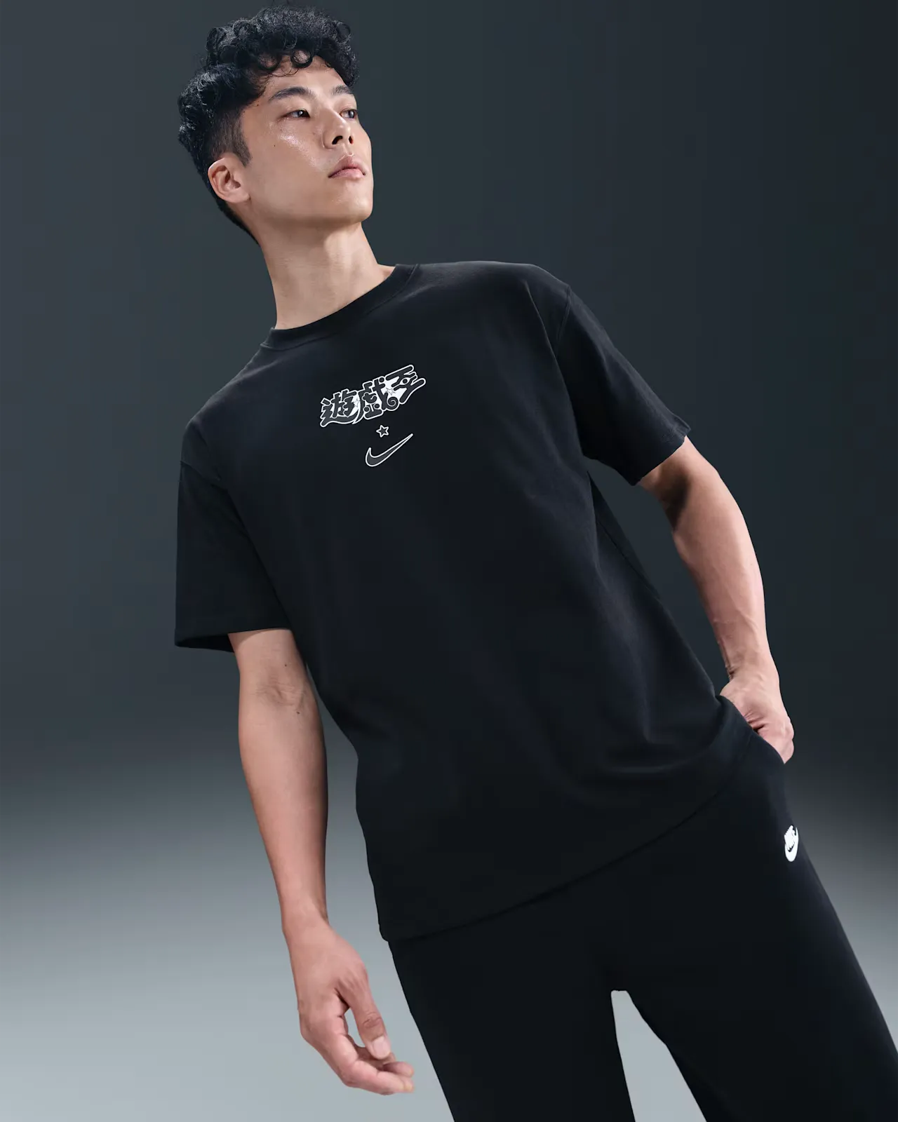 000000_Yu-Gi-Oh!-x-Nike-Solo-Swoosh-Tee_BLACK_IO7985-010_img0