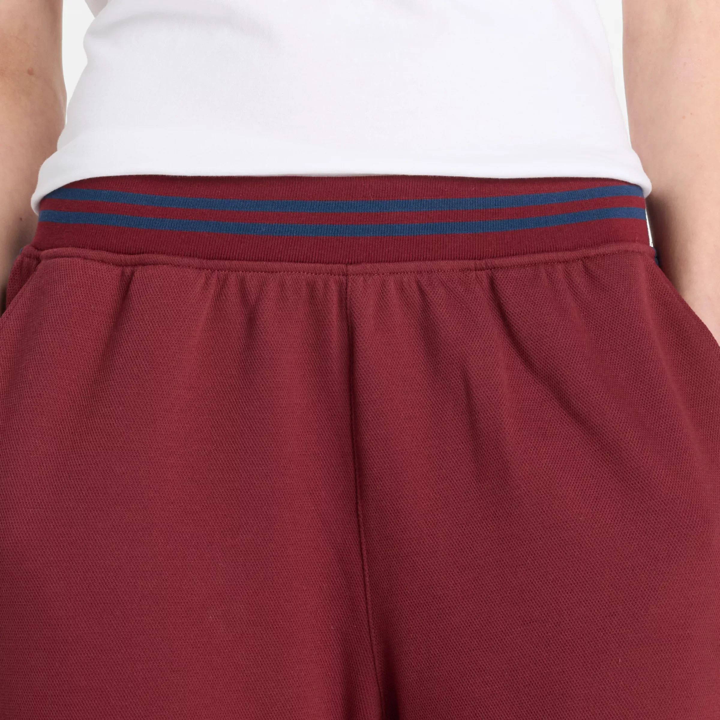722731_New-Balance-Post-Season-Pique-Track-Pant-WMNS_MONARCH-BURGUNDY_WP53501MHB_img1