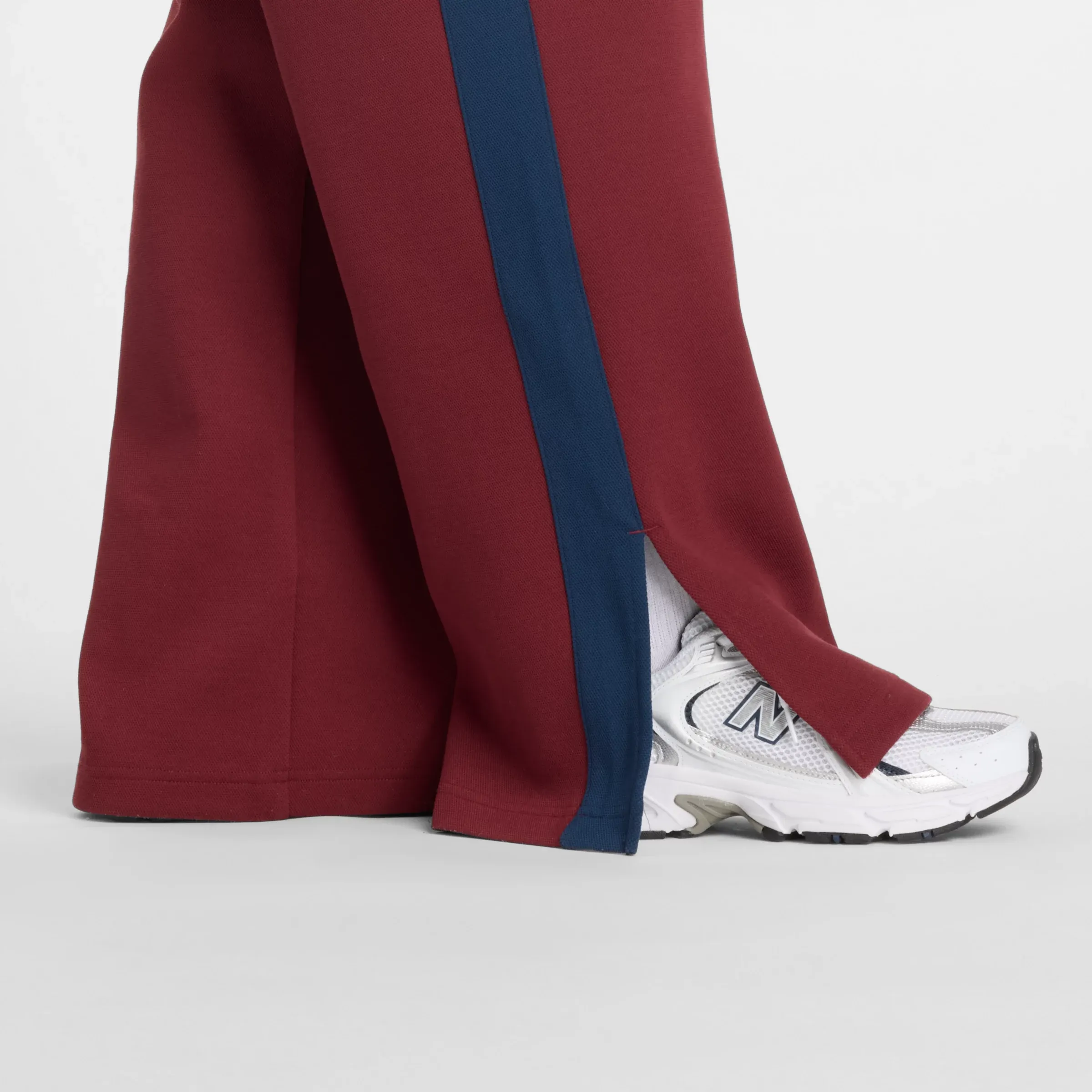 722731_New-Balance-Post-Season-Pique-Track-Pant-WMNS_MONARCH-BURGUNDY_WP53501MHB_img5