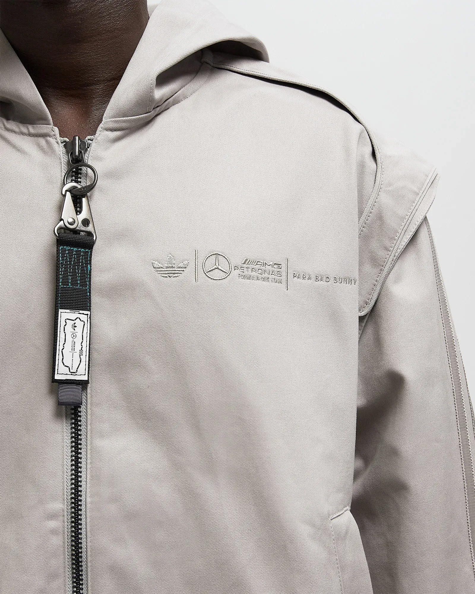 BDB3B2_Bad-Bunny-x-Mercedes-x-adidas-F1-Racing-Zip-Up_GREY_KD7594_img1