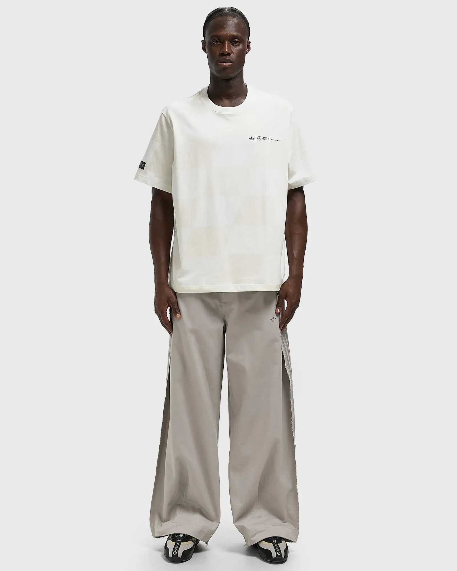 A49D94_Bad-Bunny-x-Mercedes-x-adidas-F1-Race-Pant_GREY_KD7595_img1