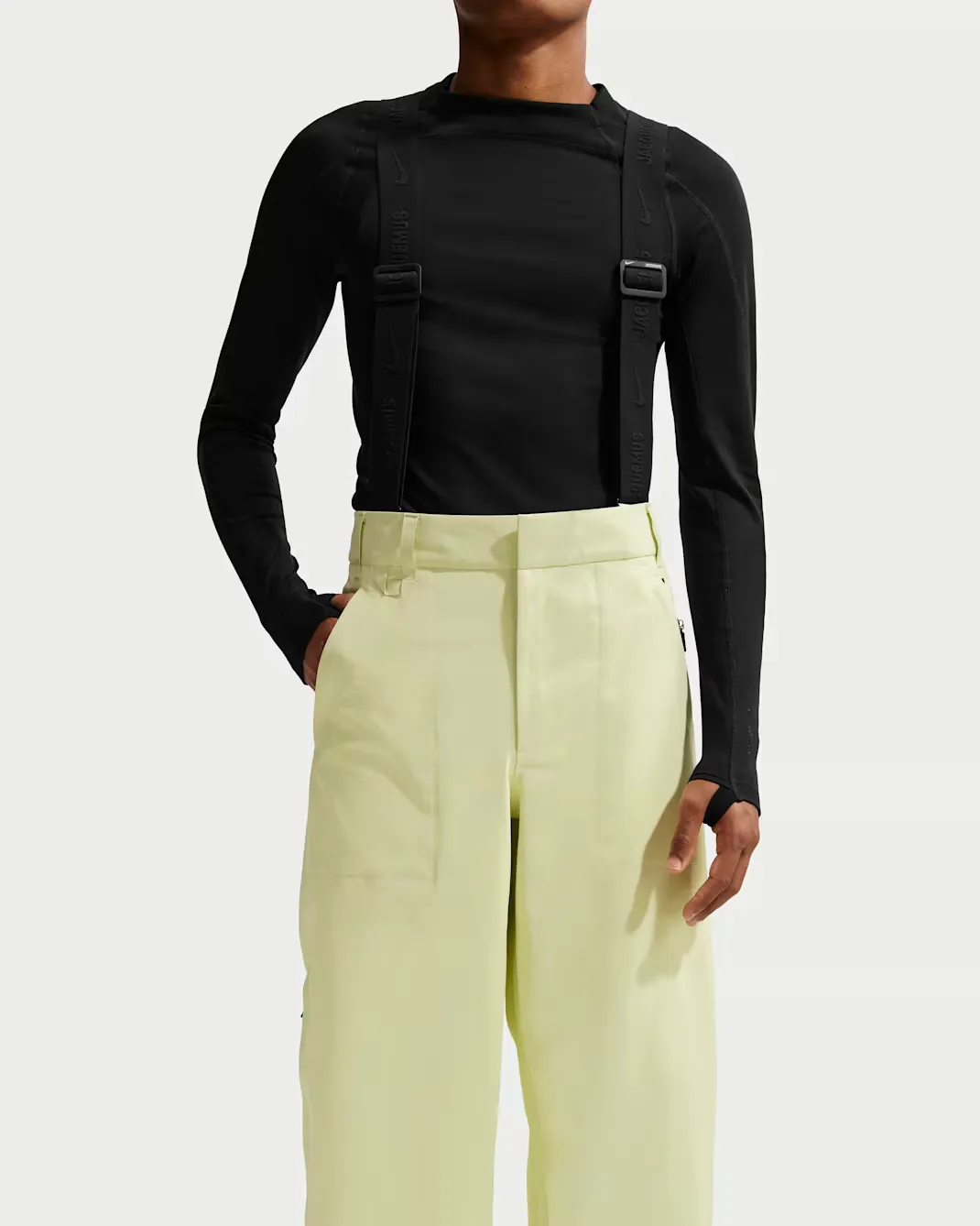 E1E0BE_Jacquemus-x-Nike-Gore-Tex-Pants_CITRON-TINT_HQ6150-868_img1