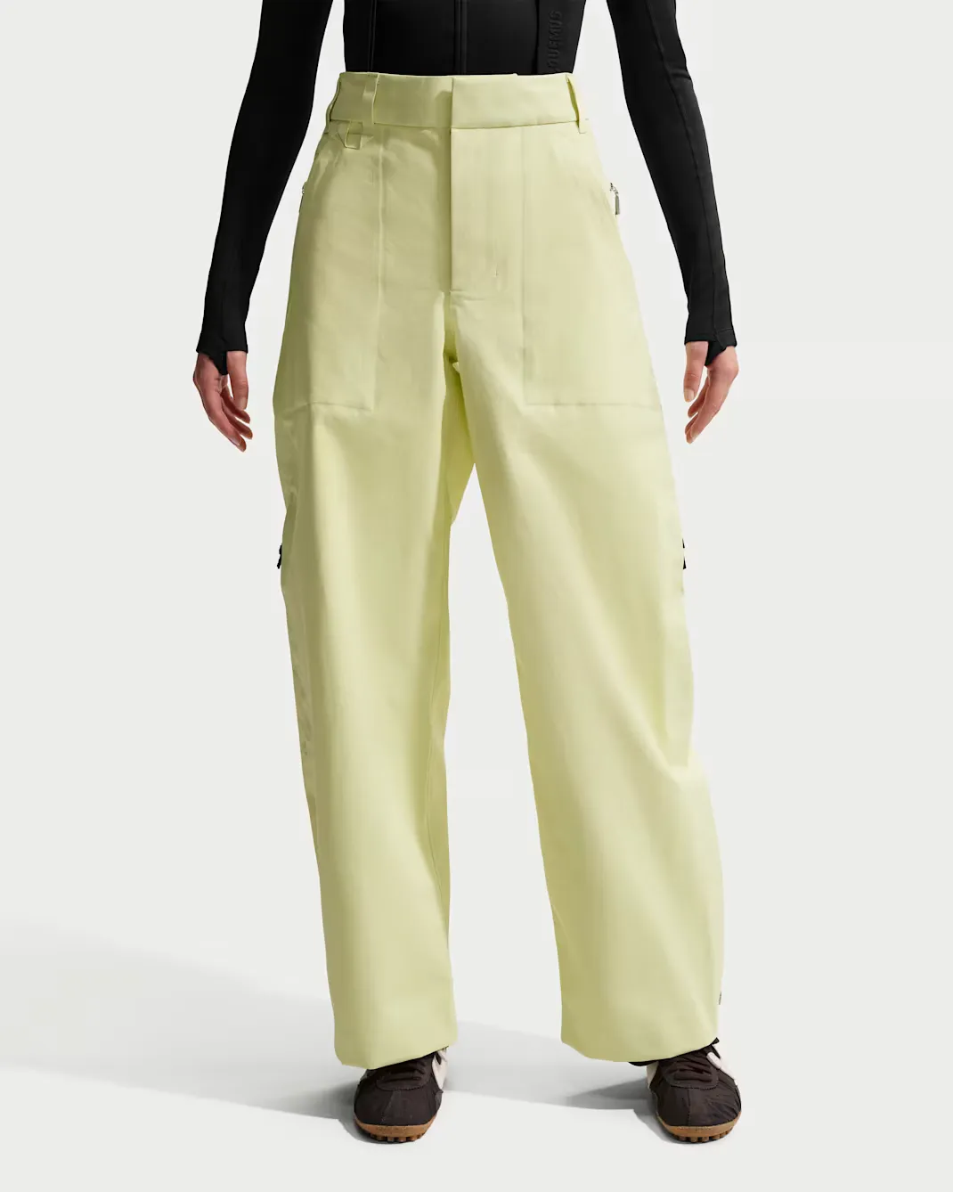 E1E0BE_Jacquemus-x-Nike-Gore-Tex-Pants_CITRON-TINT_HQ6150-868_img0