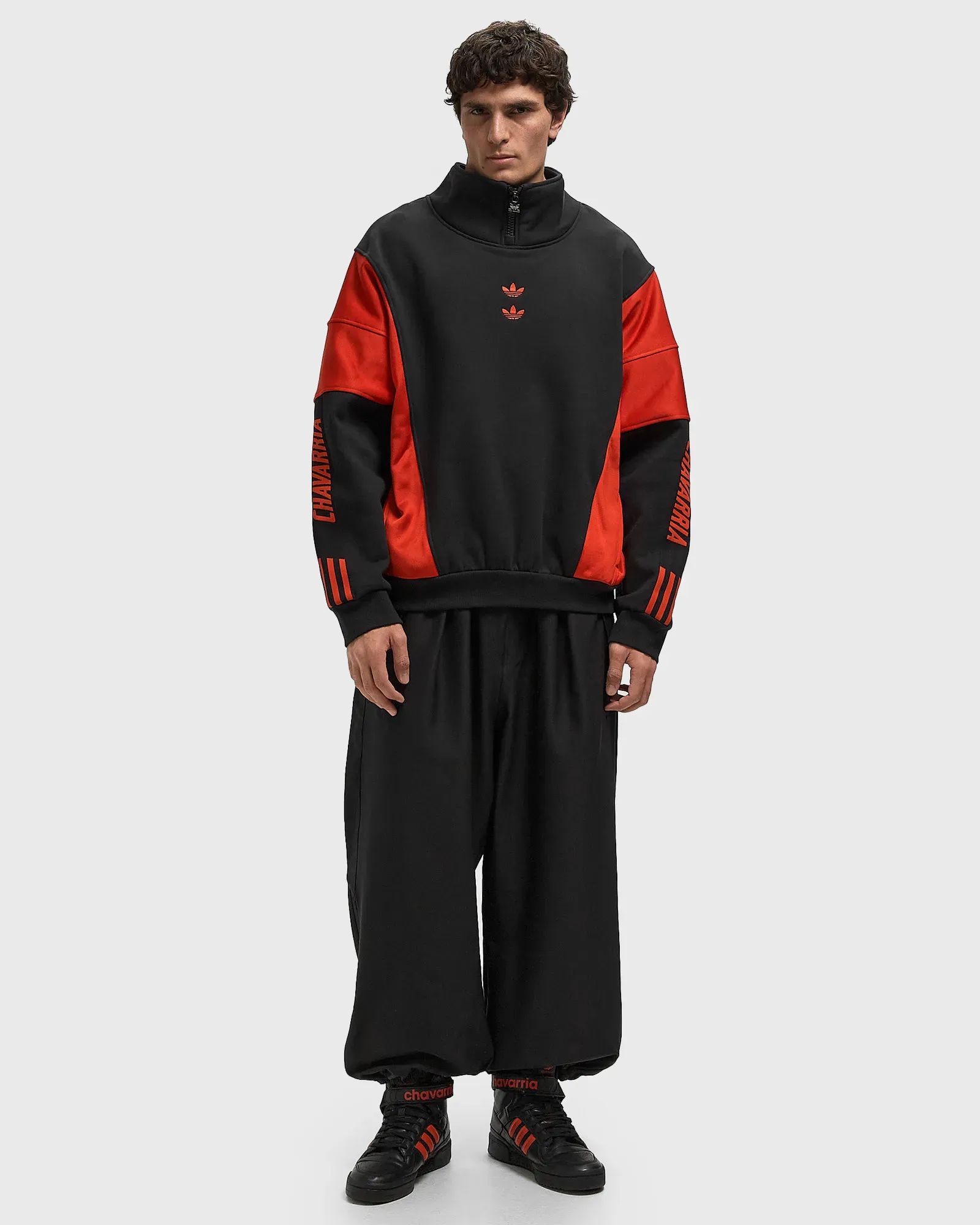 000000_Willy-Chavarria-x-adidas-Watsonville-Mockneck-Jumper_BLACK-RED_KD9347_img1