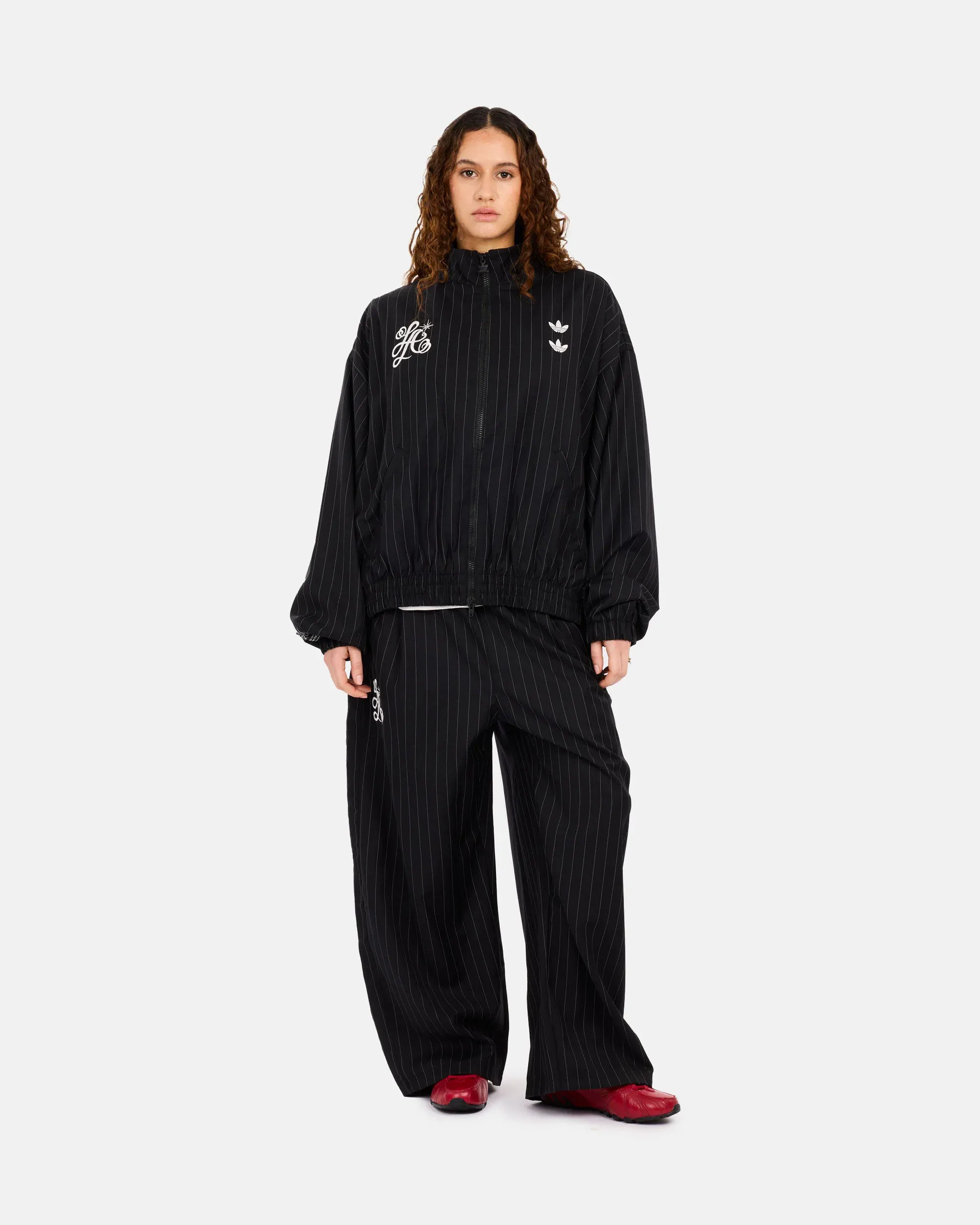 000000_Willy-Chavarria-x-adidas-Originals-Pinstripe-Track-Jacket_BLACK-WHITE_KR8696_img4