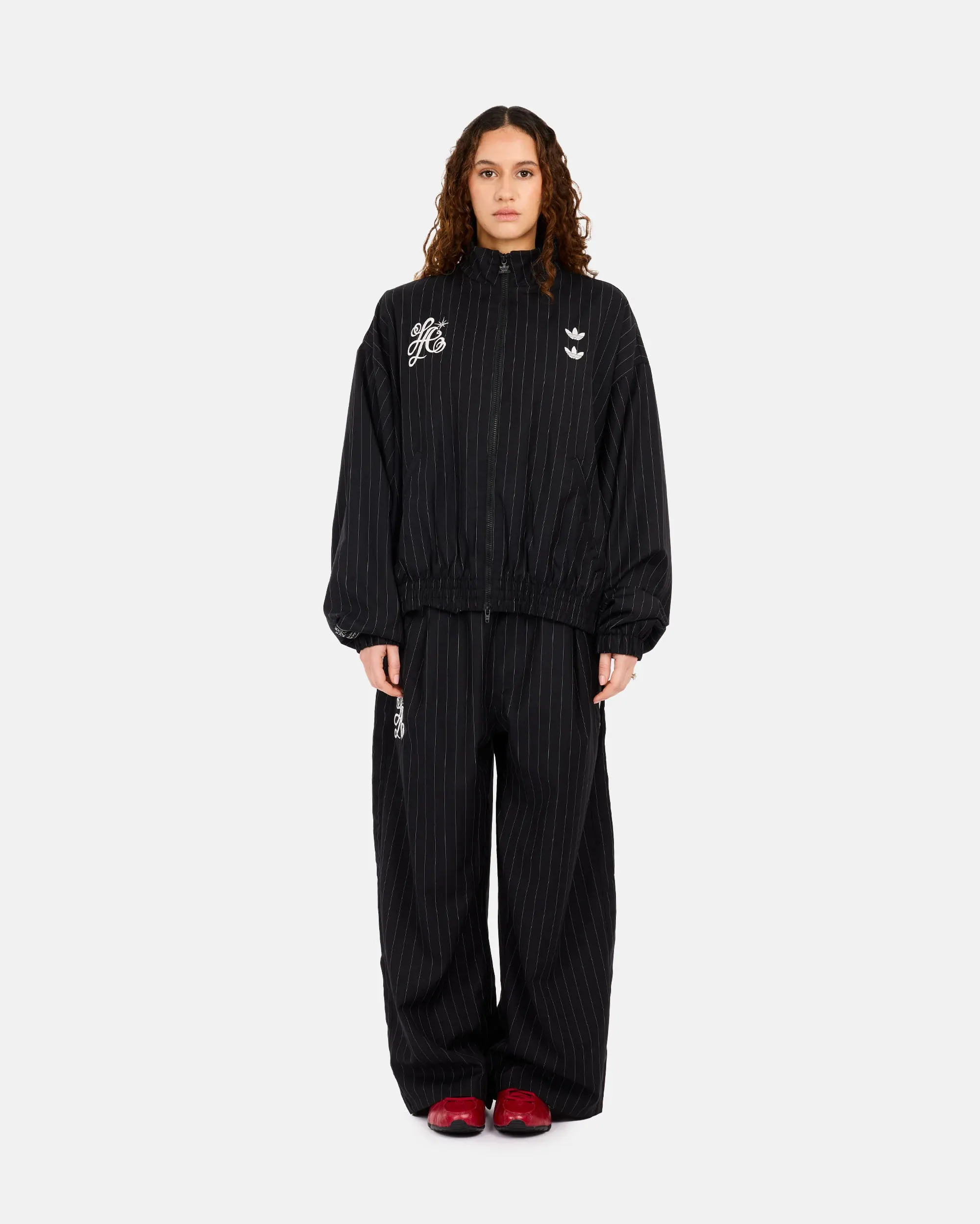 000000_adidas-Originals-x-Willy-Chavarria-Pinstripe-Track-Pant_BLACK-WHITE_KR8688_img1