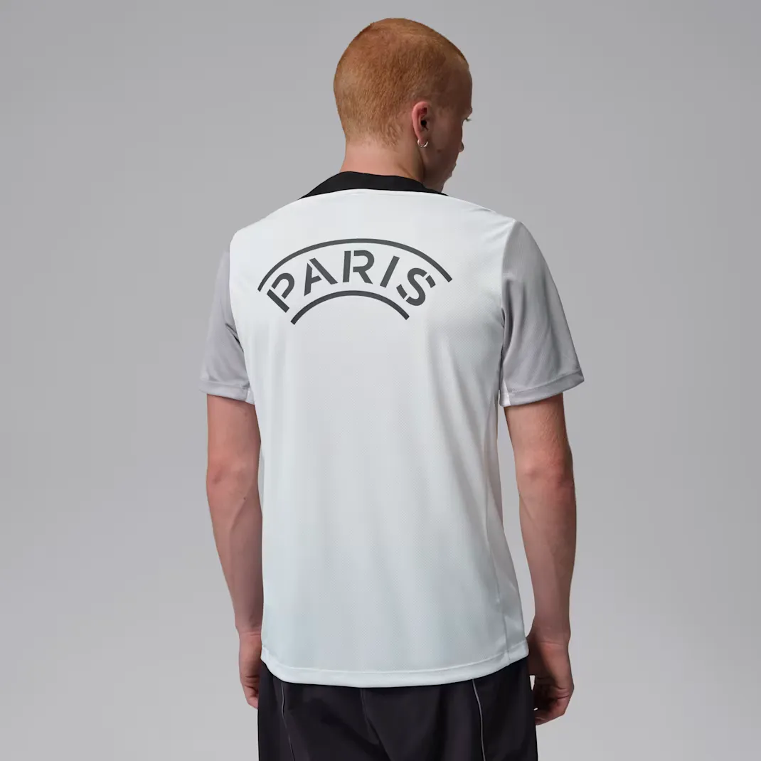 000000_Paris-Saint-Germain-Jordan-Strike-Training-T-Shirt-Night-Edition-2026_White-Atmosphere-Grey_IO4836-101_img1