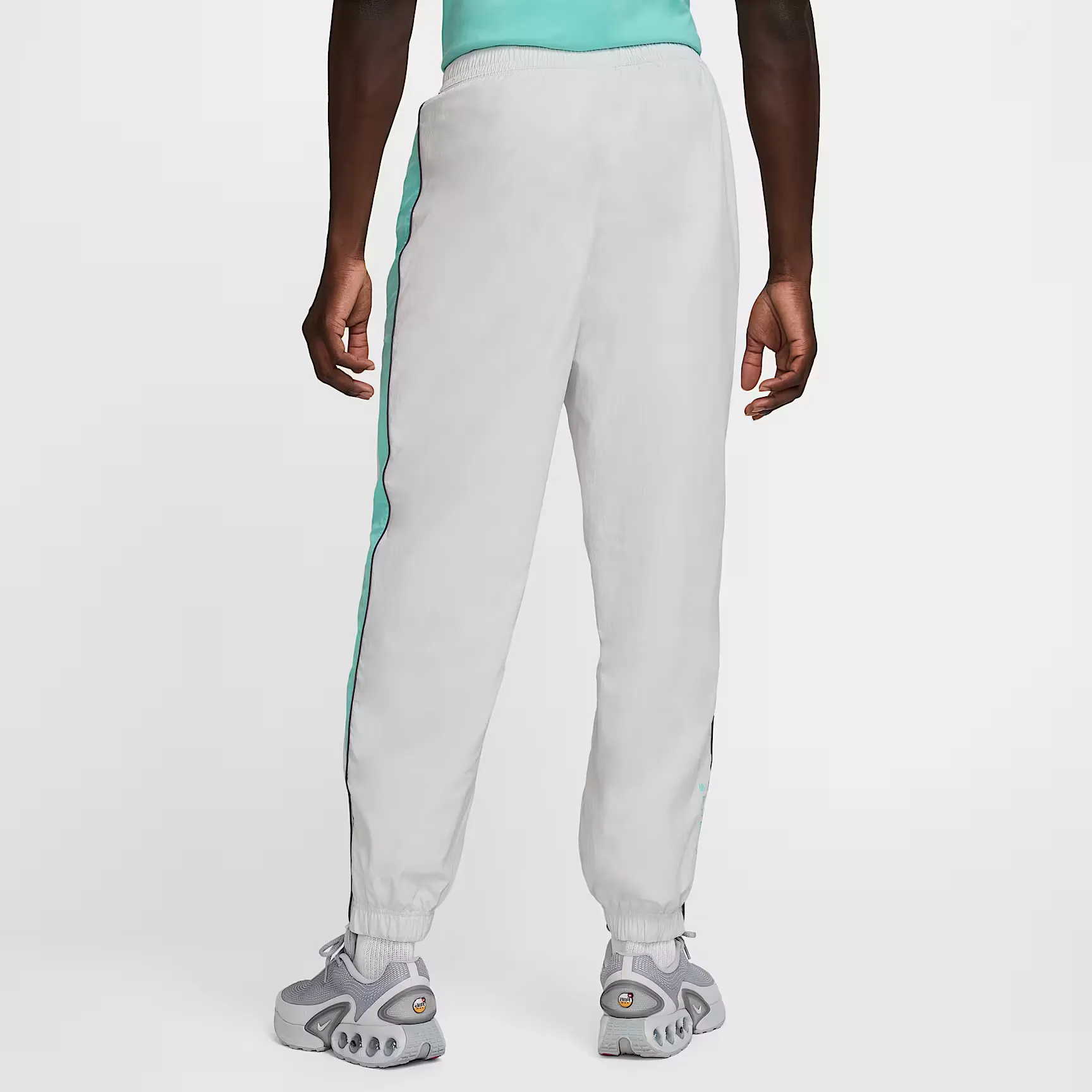 000000_Nike-Air-Woven-Pants_PHOTON-DUST-TROPICAL-TWIST_HM0170-025_img1