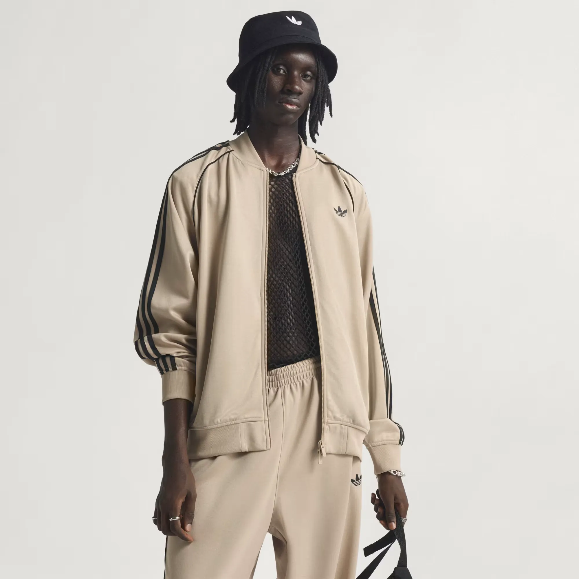 000000_adidas-Adicolor-Classics-SST-Oversized-Track-Jacket_Stone-Khaki-Black_KC8524_img0