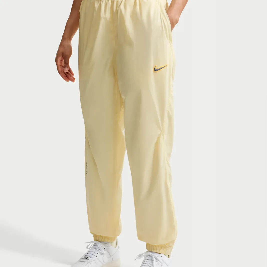 Nocta-x-Nike-Northstar-Nylon-Track-Pants_Alabaster_FN7668-744_img2