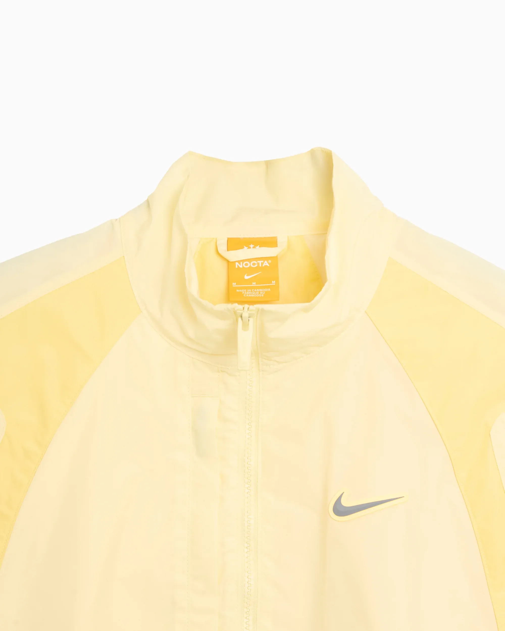 000000_Nike-x-Drake-NOCTA-Woven-Track-Jacket_Alabaster_FN7666-744_img1