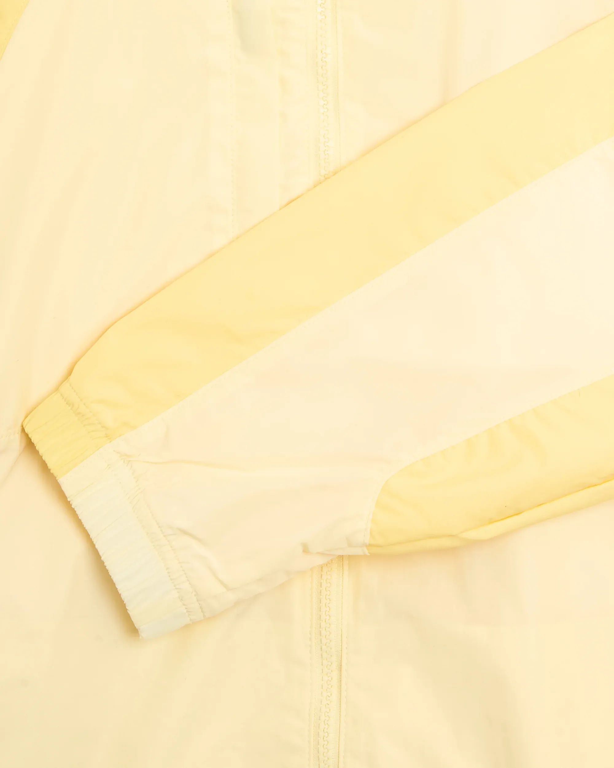 000000_Nike-x-Drake-NOCTA-Woven-Track-Jacket_Alabaster_FN7666-744_img2