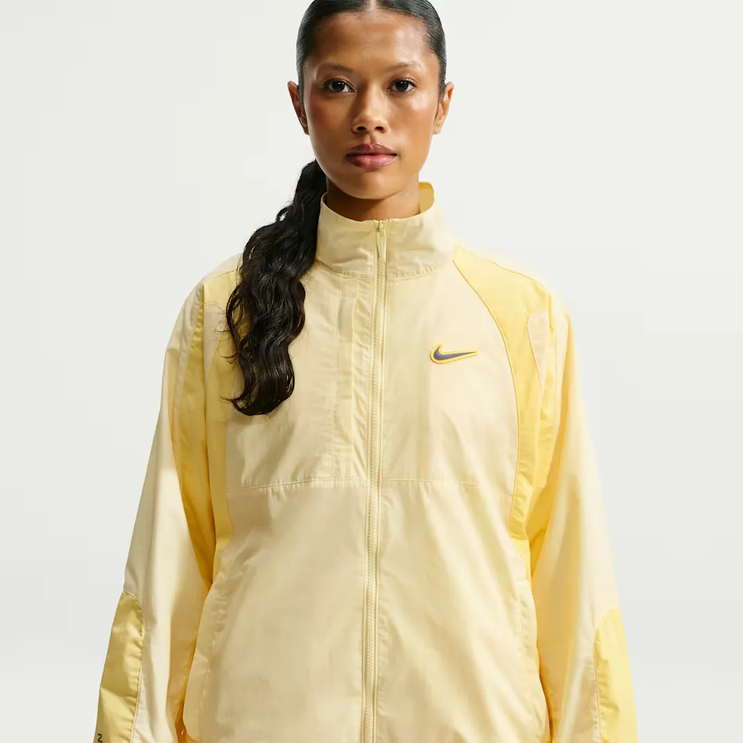 Nocta-x-Nike-Woven-Track-Jacket_Alabaster_FN7666-744_img1