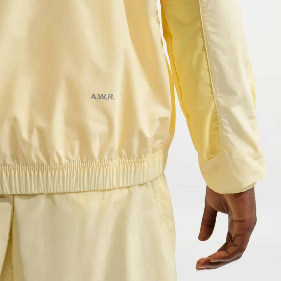 Nocta-x-Nike-Woven-Track-Jacket_Alabaster_FN7666-744_img10