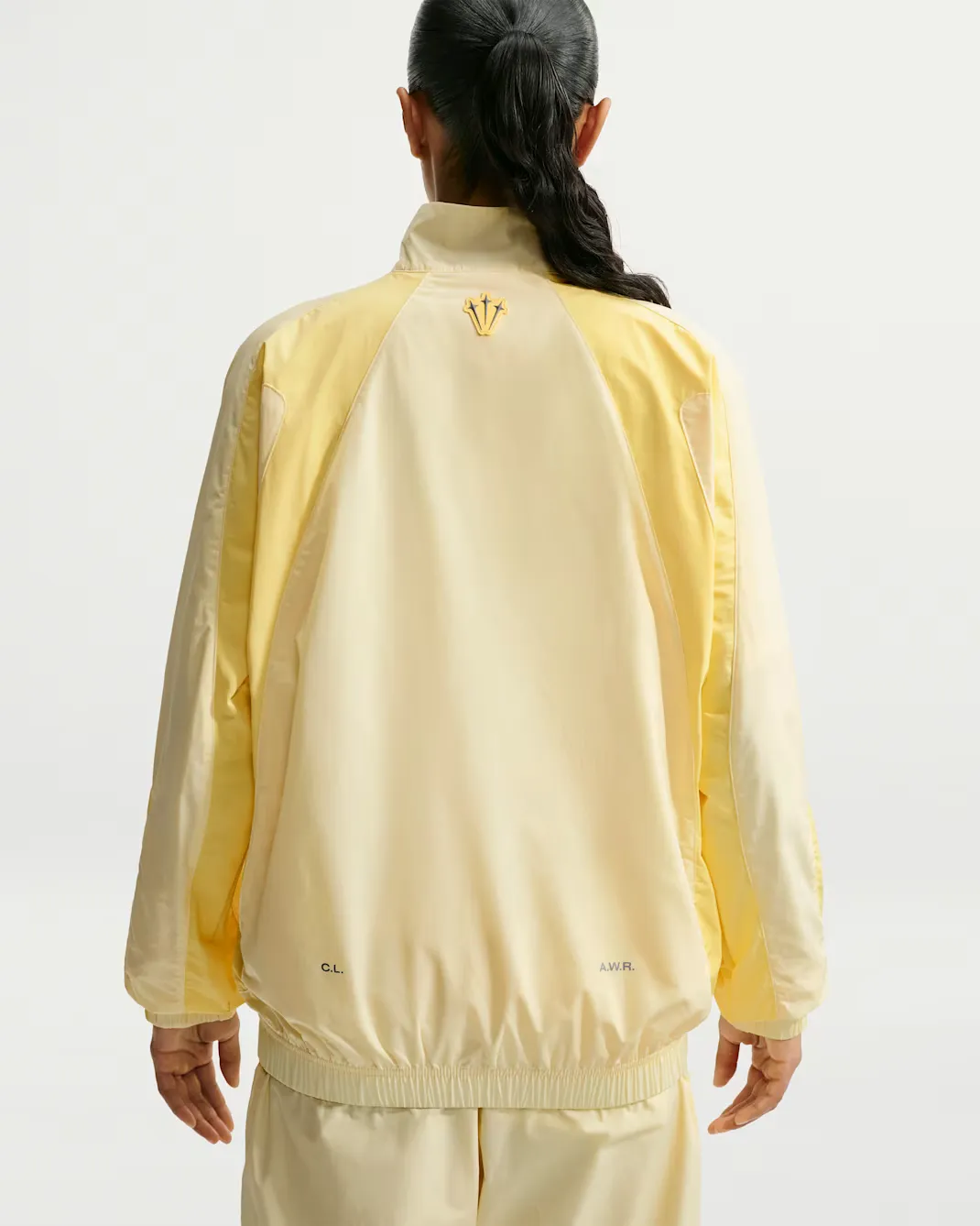 Nocta-x-Nike-Woven-Track-Jacket_Alabaster_FN7666-744_img12