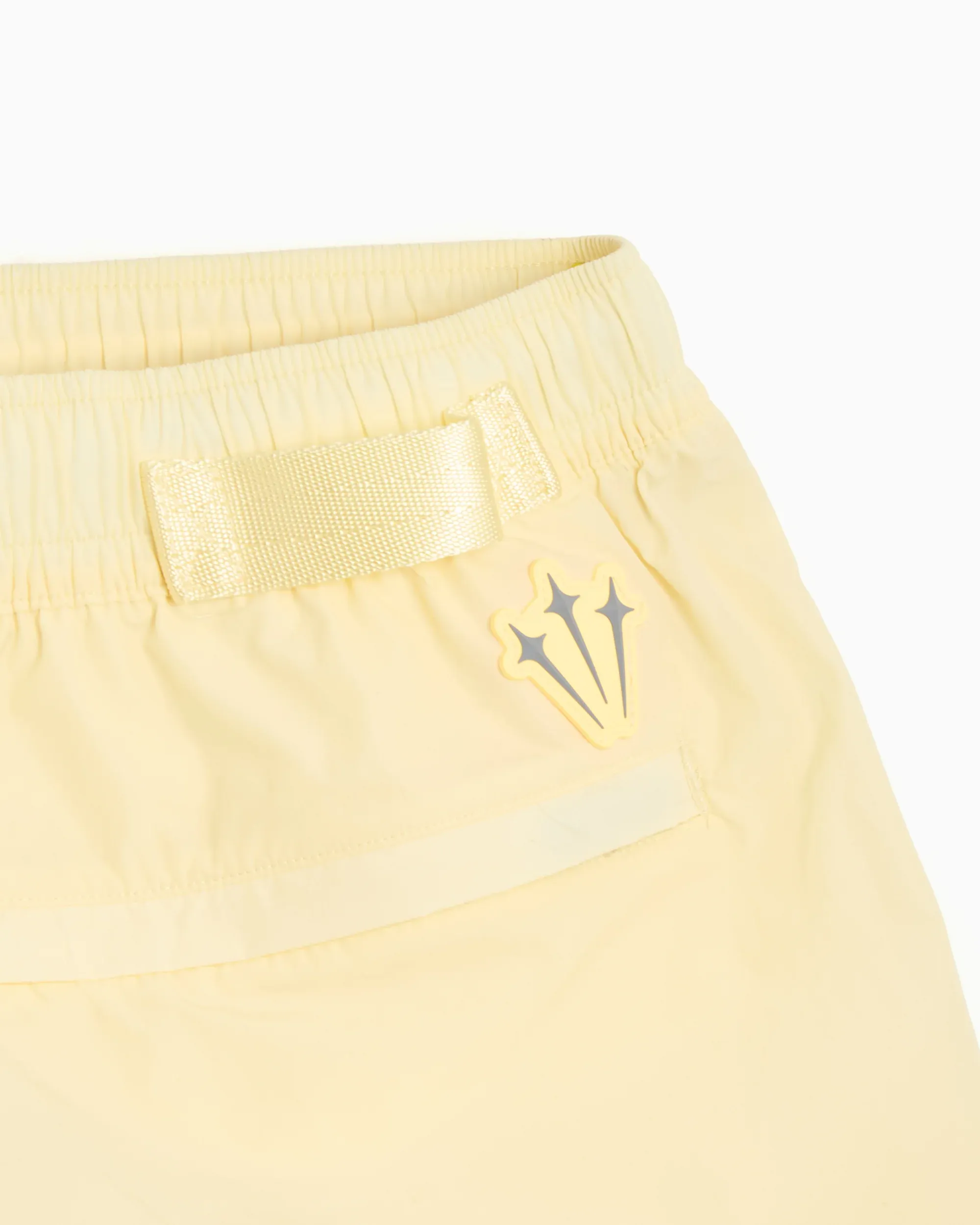 000000_Nike-x-Drake-NOCTA-Woven-Shorts_Butter-Yellow_FN8194-744_img1