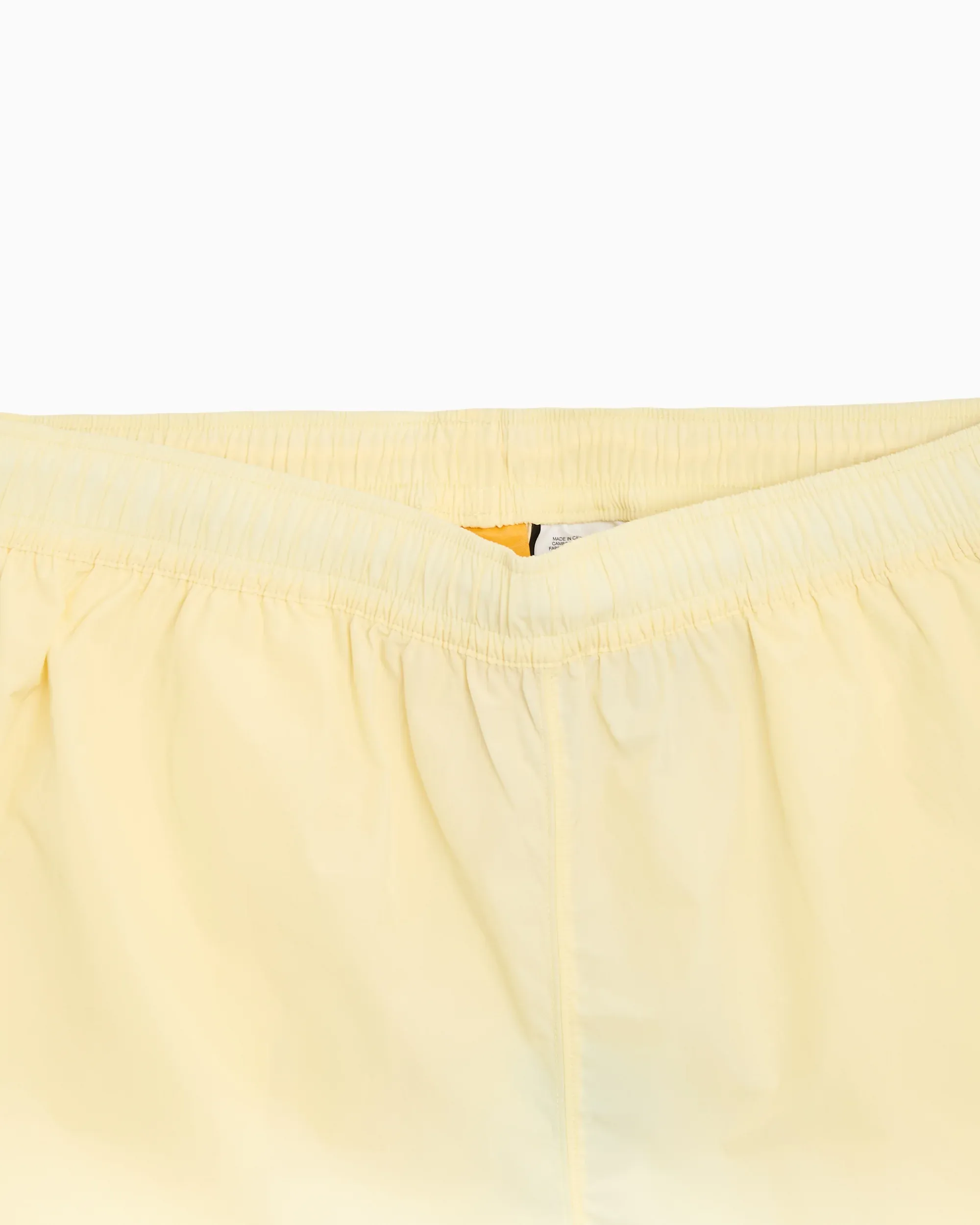 000000_Nike-x-Drake-NOCTA-Woven-Shorts_Butter-Yellow_FN8194-744_img3