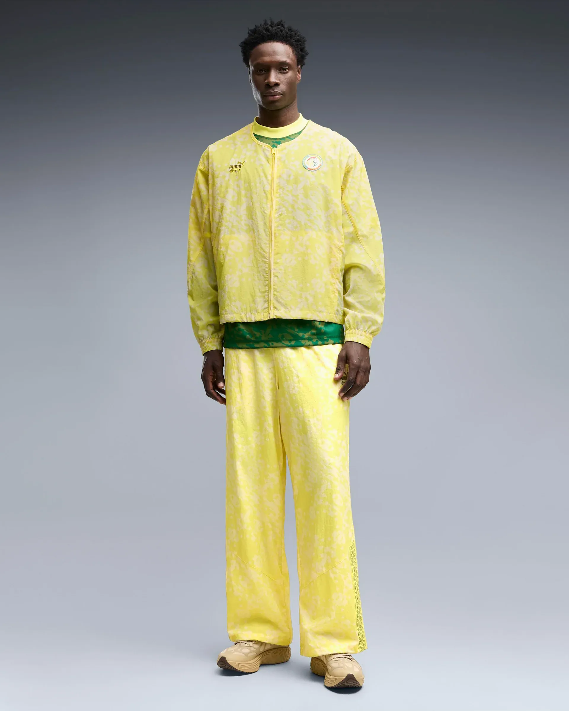 000000_Puma-x-Salehe-Bembury-x-Senegal-King-Logo-Relaxed-Mens-Track-Jacket_Yellow_635135-36_img1
