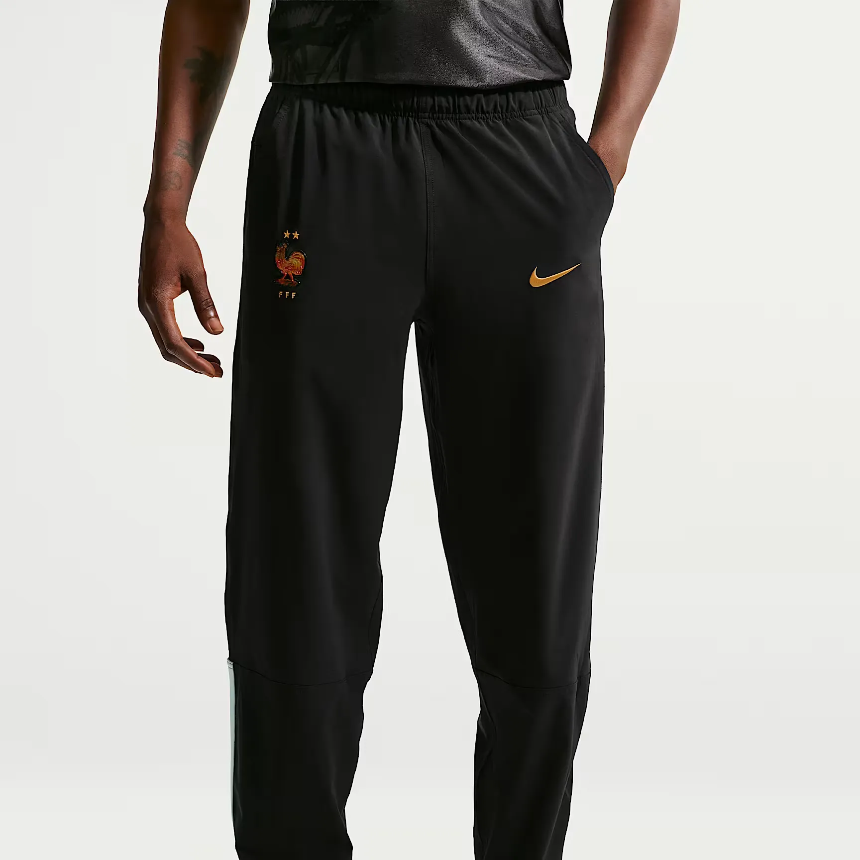 000000_Nike-Dri-FIT-FFF-Energy-Woven-Football-Pants_Black-Copper_IH1881-010_img1