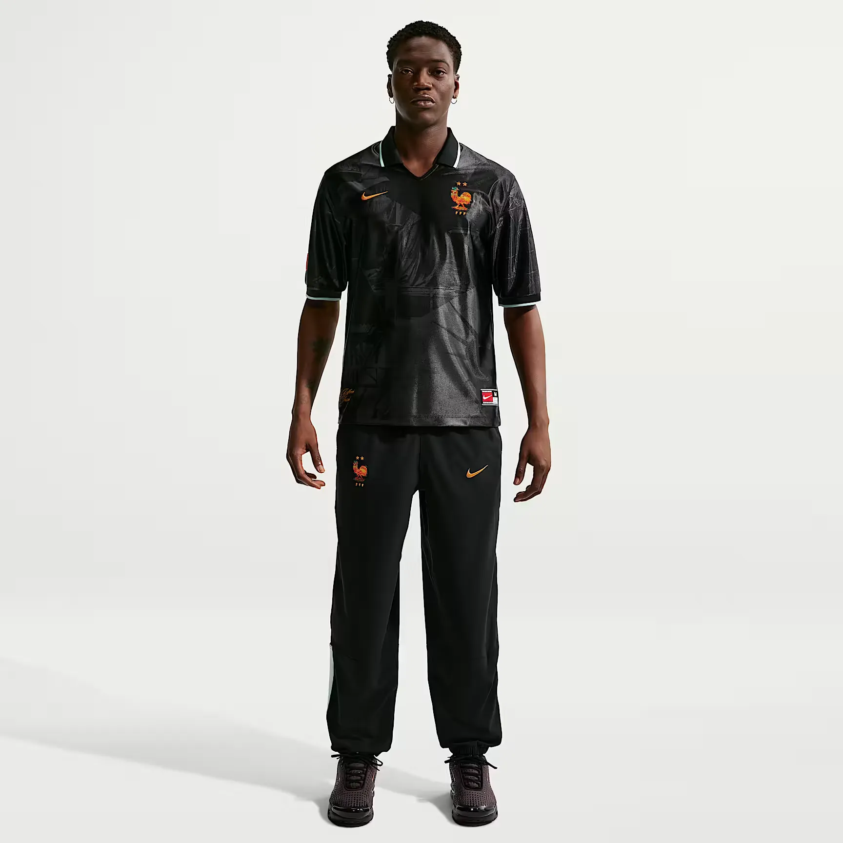 000000_Nike-Dri-FIT-FFF-Energy-Woven-Football-Pants_Black-Copper_IH1881-010_img0