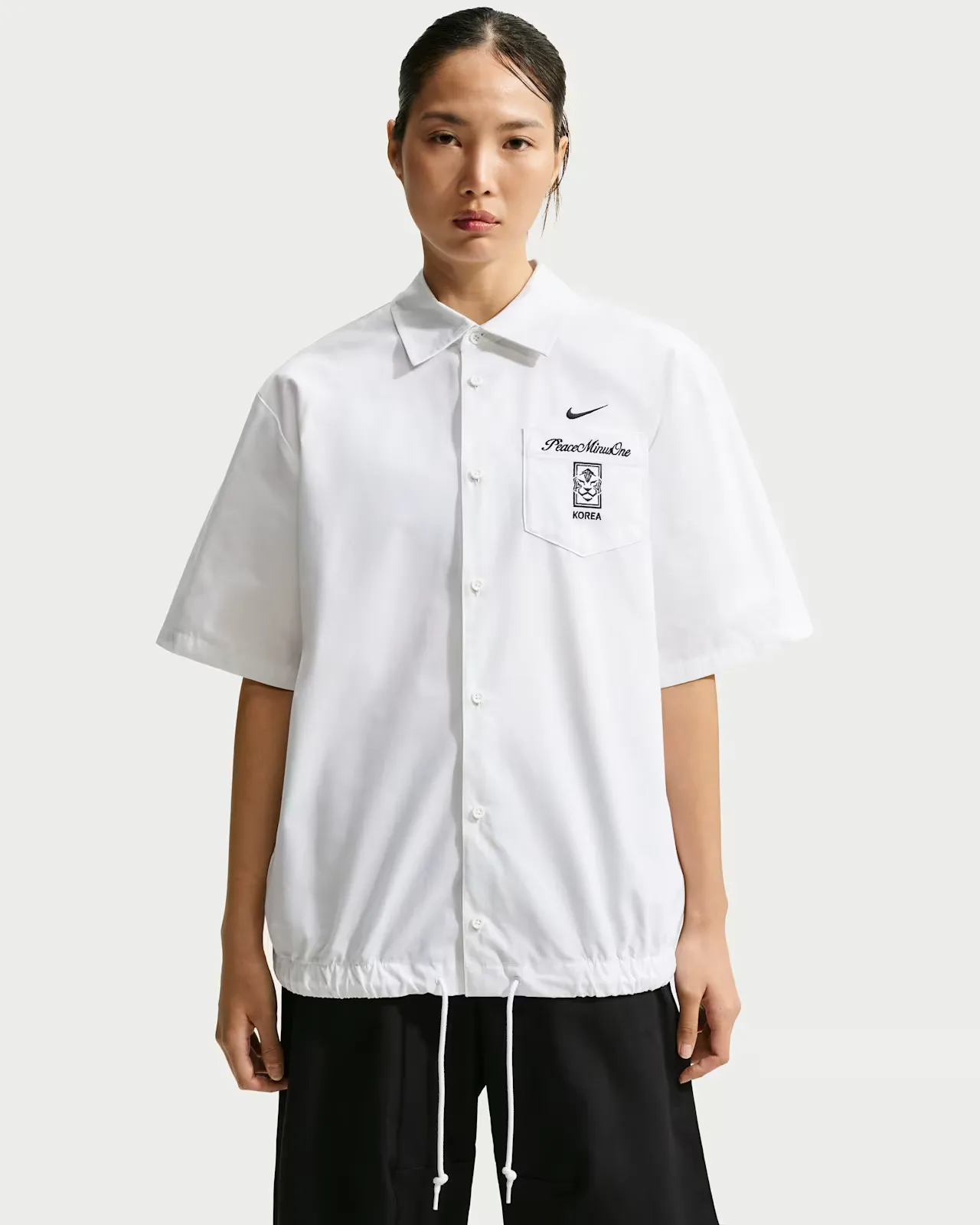 PEACEMINUSONE-x-South-Korea-x-Nike-Short-Sleeve-Top_White_IM3219-100_img0