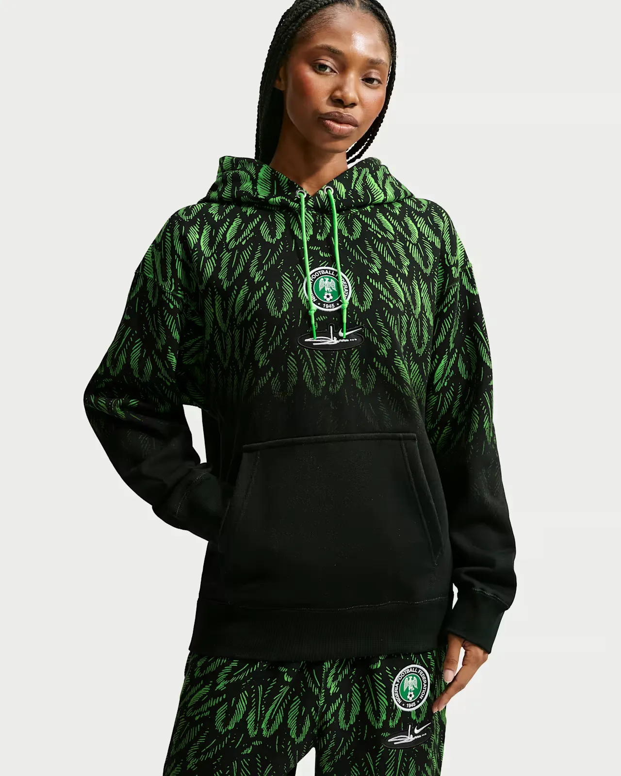 Slawn-x-Nigeria-x-Nike-Fleece-Hoodie_Black-Green_IR5219-010_img1