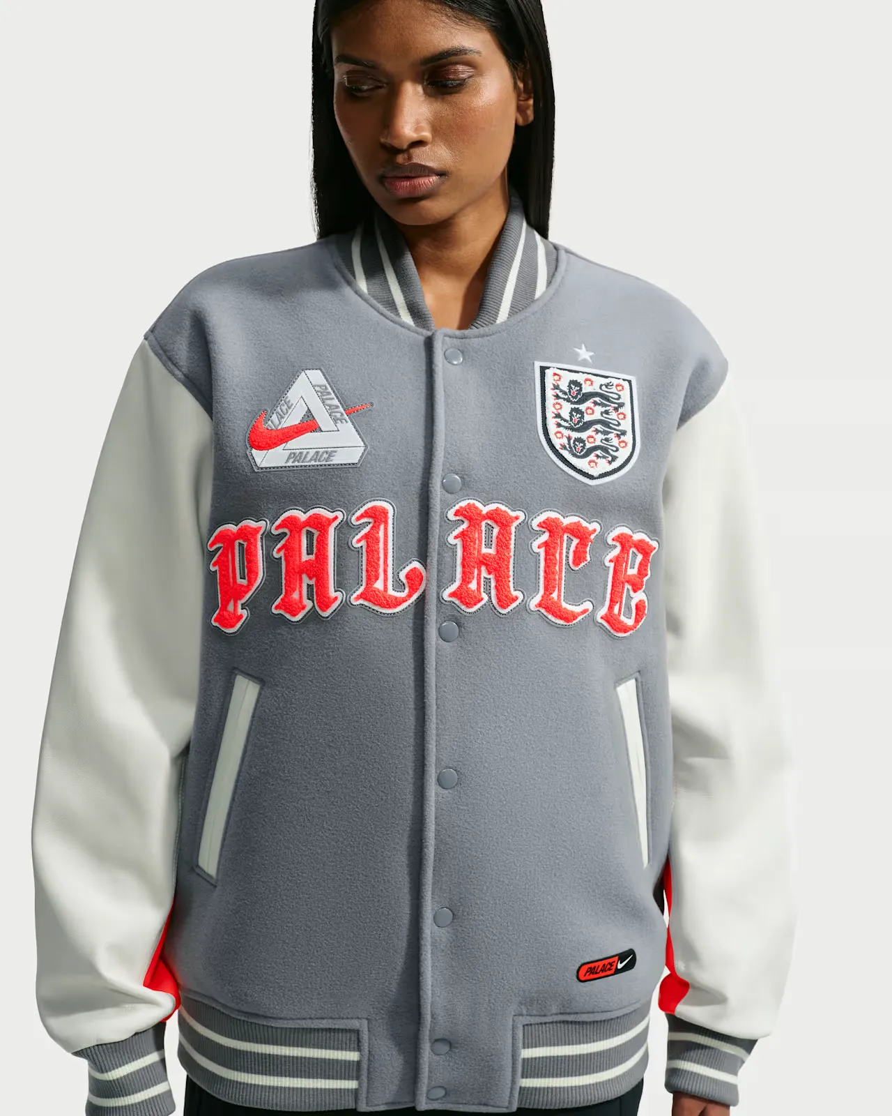 Palace-x-England-x-Nike-Varsity-Jacket_Grey_IM6636-065_img1