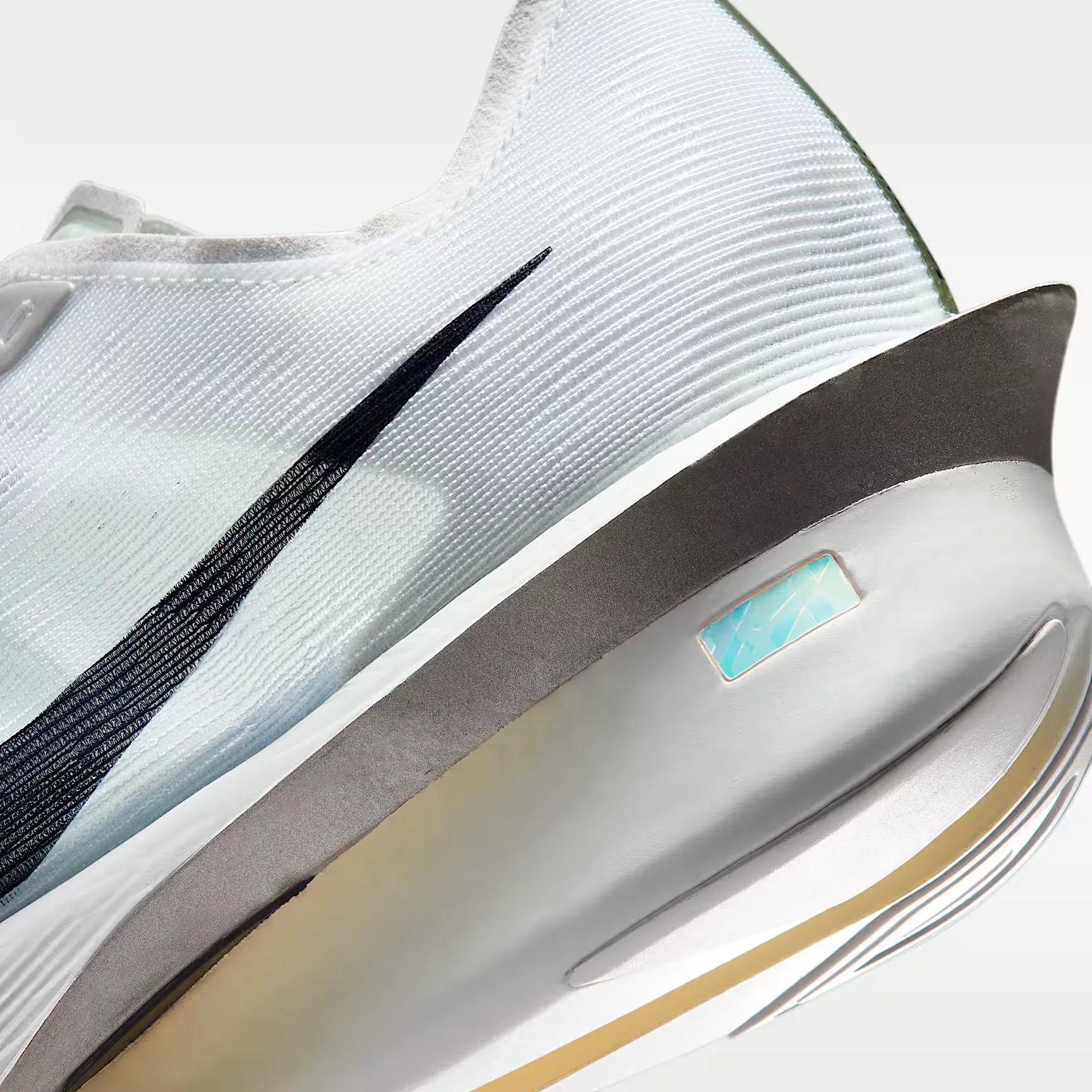 000000_Nike-Vaporfly-4_Spruce-Aura_IM8203-001_img7