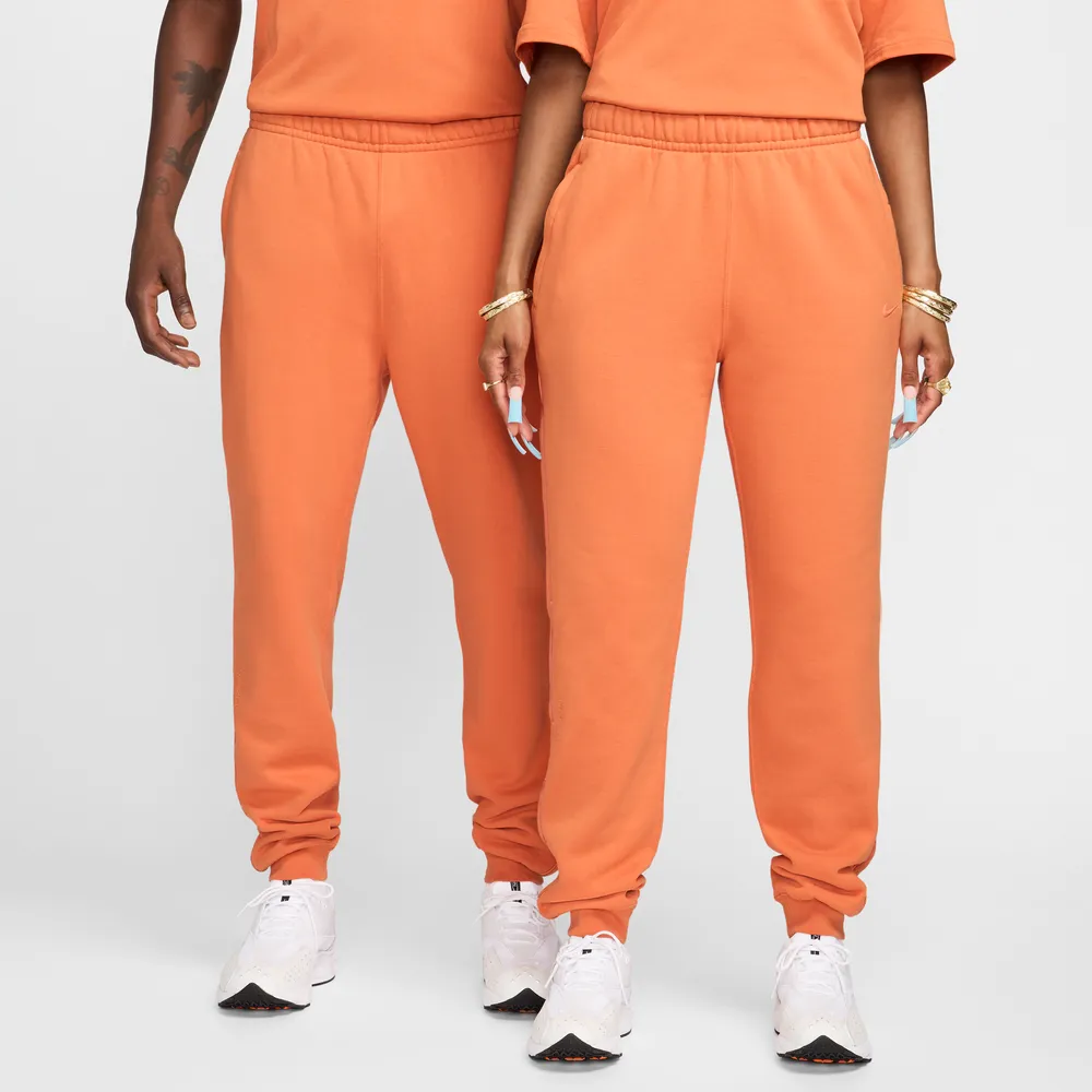 FF9D6A_NOCTA-x-Nike-NRG-Fleece-Pants_HOT-CURRY-ORANGE-TRANCE_FN7661-808_img0
