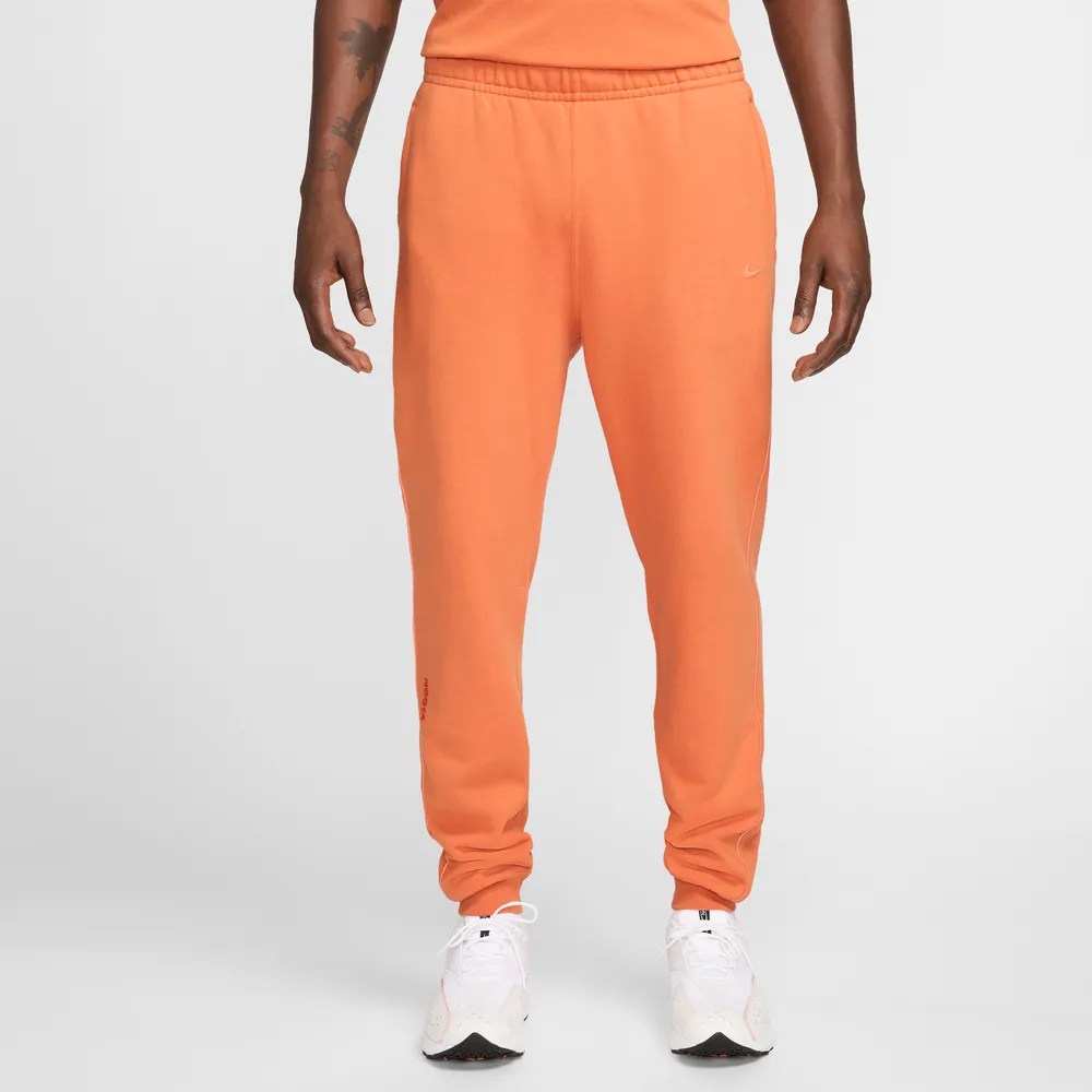 FF9D6A_NOCTA-x-Nike-NRG-Fleece-Pants_HOT-CURRY-ORANGE-TRANCE_FN7661-808_img1