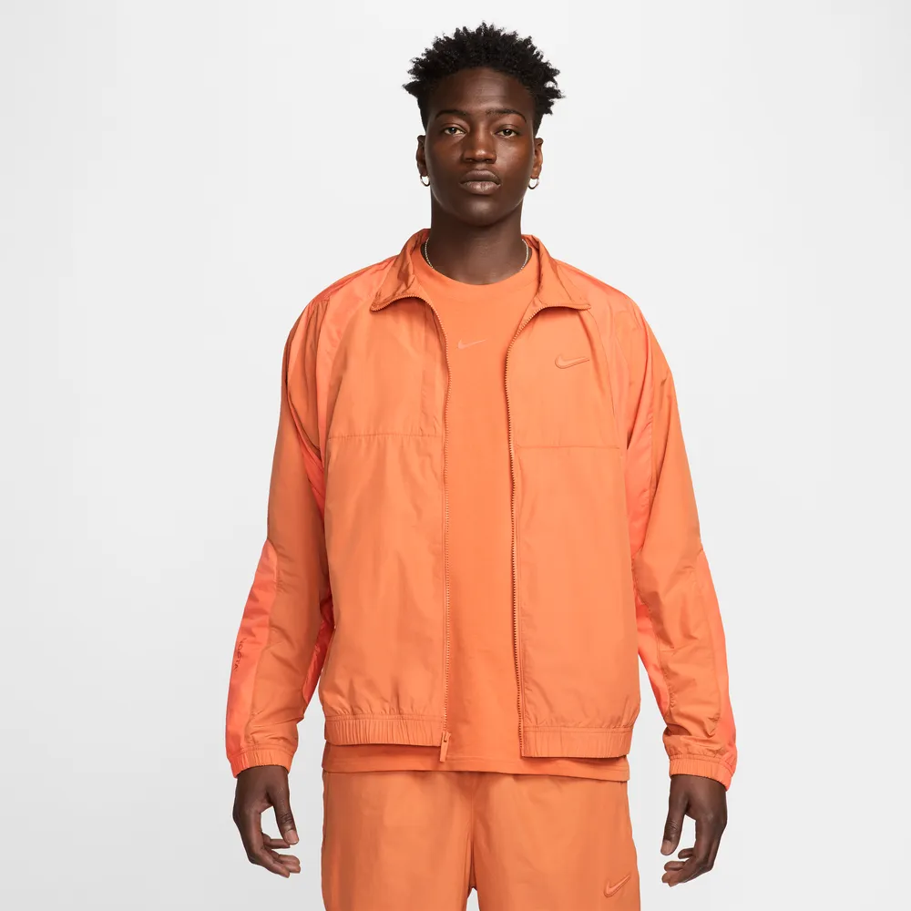 FF9D6A_NOCTA-x-NikeLab-Nylon-Track-Jacket_HOT-CURRY-ORANGE-TRANCE_FN7666-808_img1