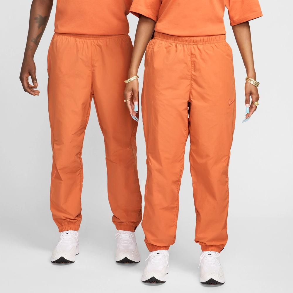 FF9D6A_NOCTA-x-NikeLab-Nylon-Track-Pants_HOT-CURRY-ORANGE-TRANCE_FN7668-808_img0
