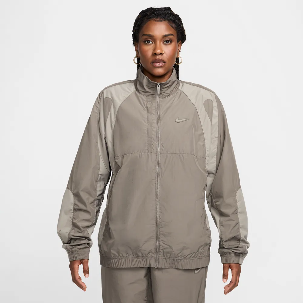867669_NOCTA-x-Nike-Woven-Tracksuit-Jacket_BROWN-GREY_FN7666-040_img2
