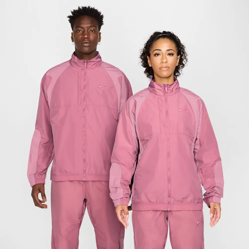 DD959F_NOCTA-x-Nike-Nylon-Tracksuit-Jacket_DESERT-BERRY_FN7666-667_img0