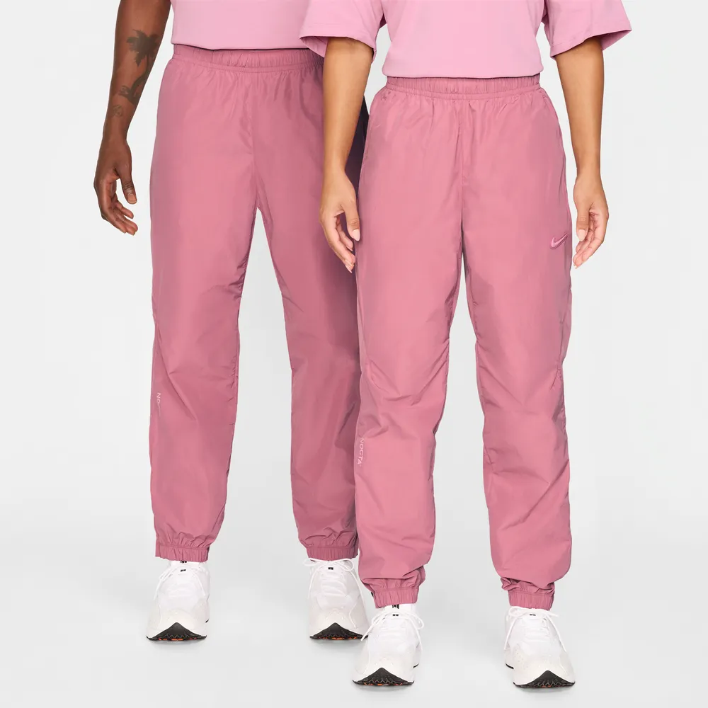 C37A86_NOCTA-x-Nike-Nylon-Track-Pant_DESERT-BERRY_FN7668-667_img0