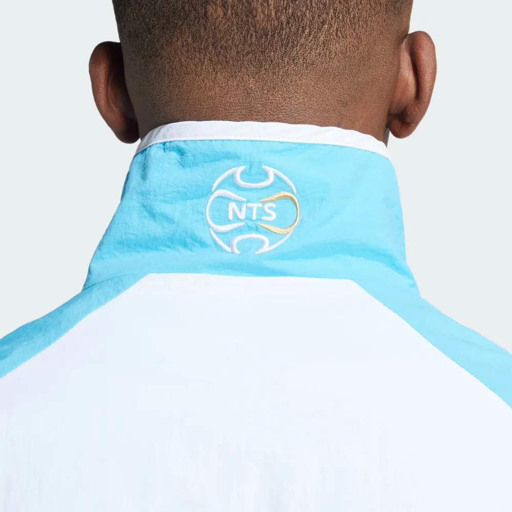 91E4F9_adidas-x-NTS-Radio-Allover-Print-SST-Track-Jacket_SKY-BLUE_JI5143_img4