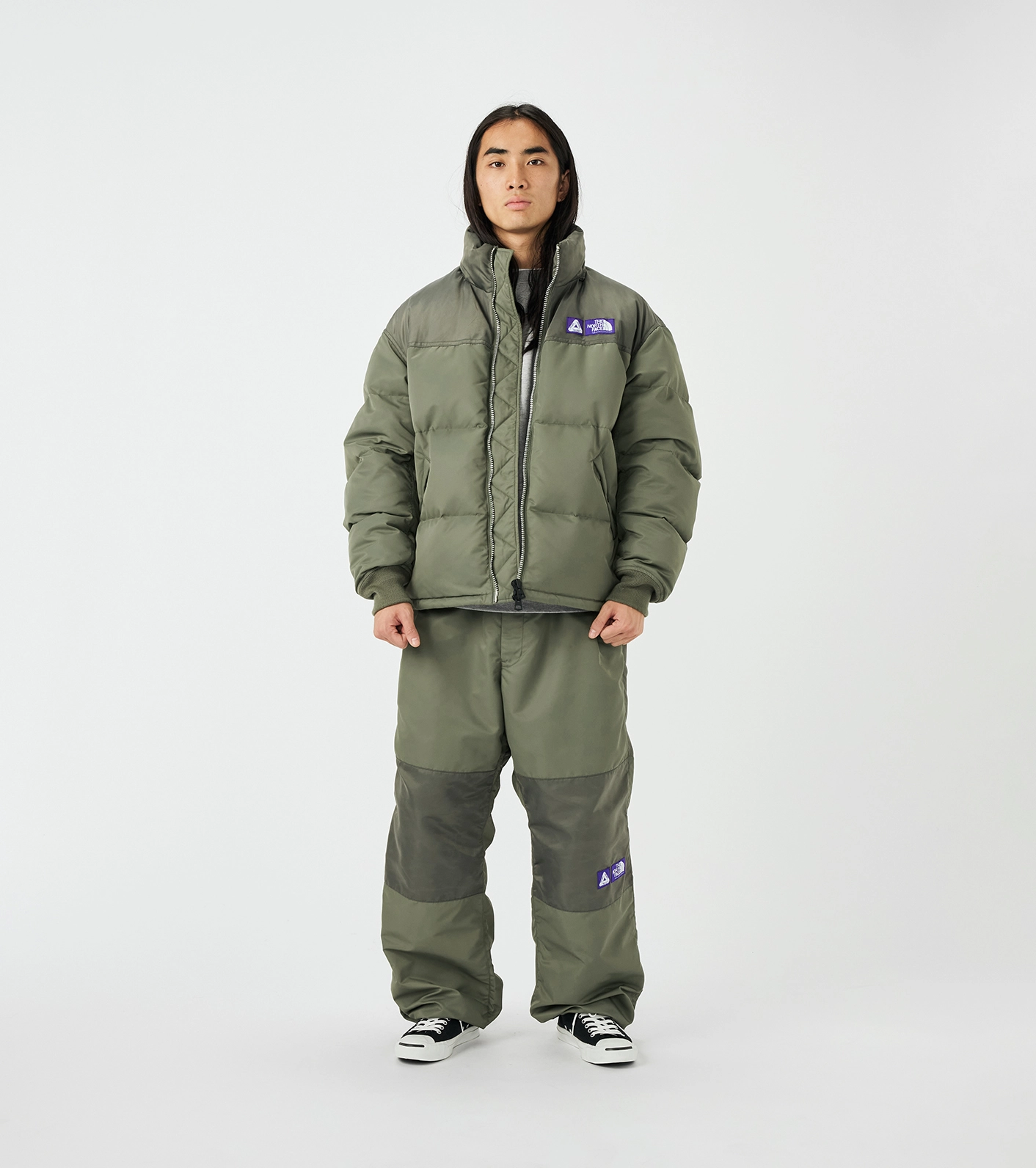 Jacket and pants The North Face x Palace in green worn by mannequin on white background